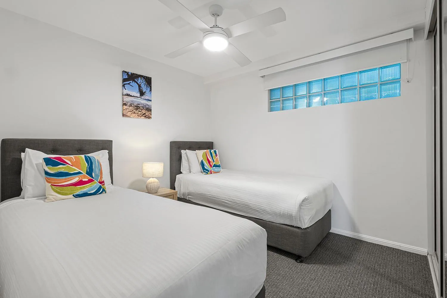 Bed in Grand Palais Boolarong Beachside Apartments