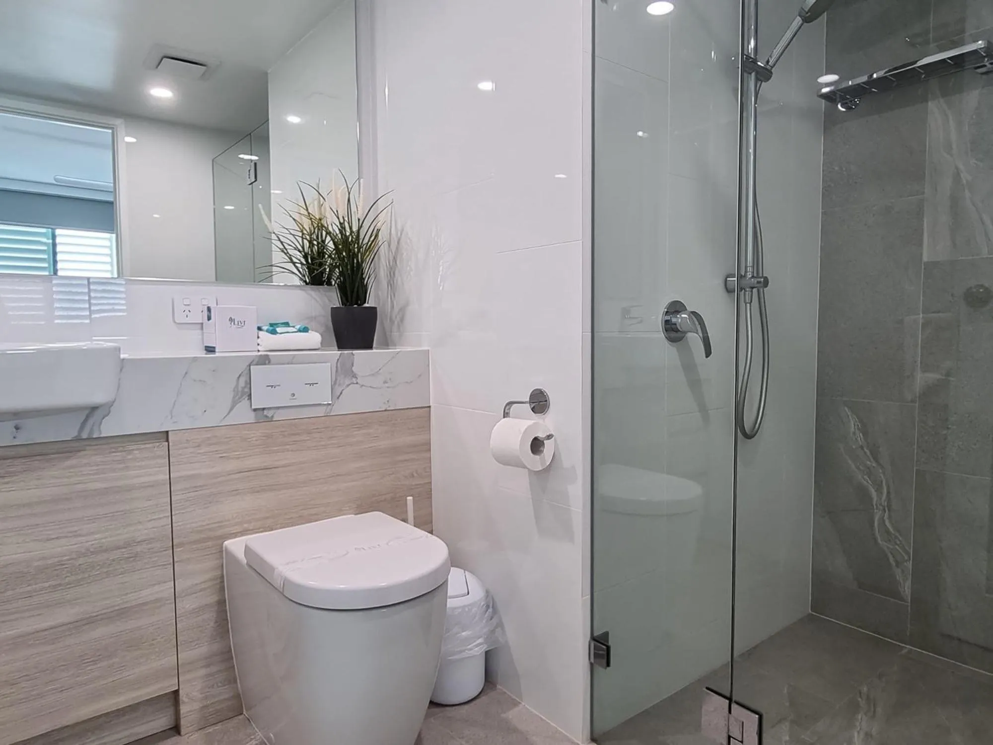 Shower in Grand Palais Boolarong Beachside Apartments