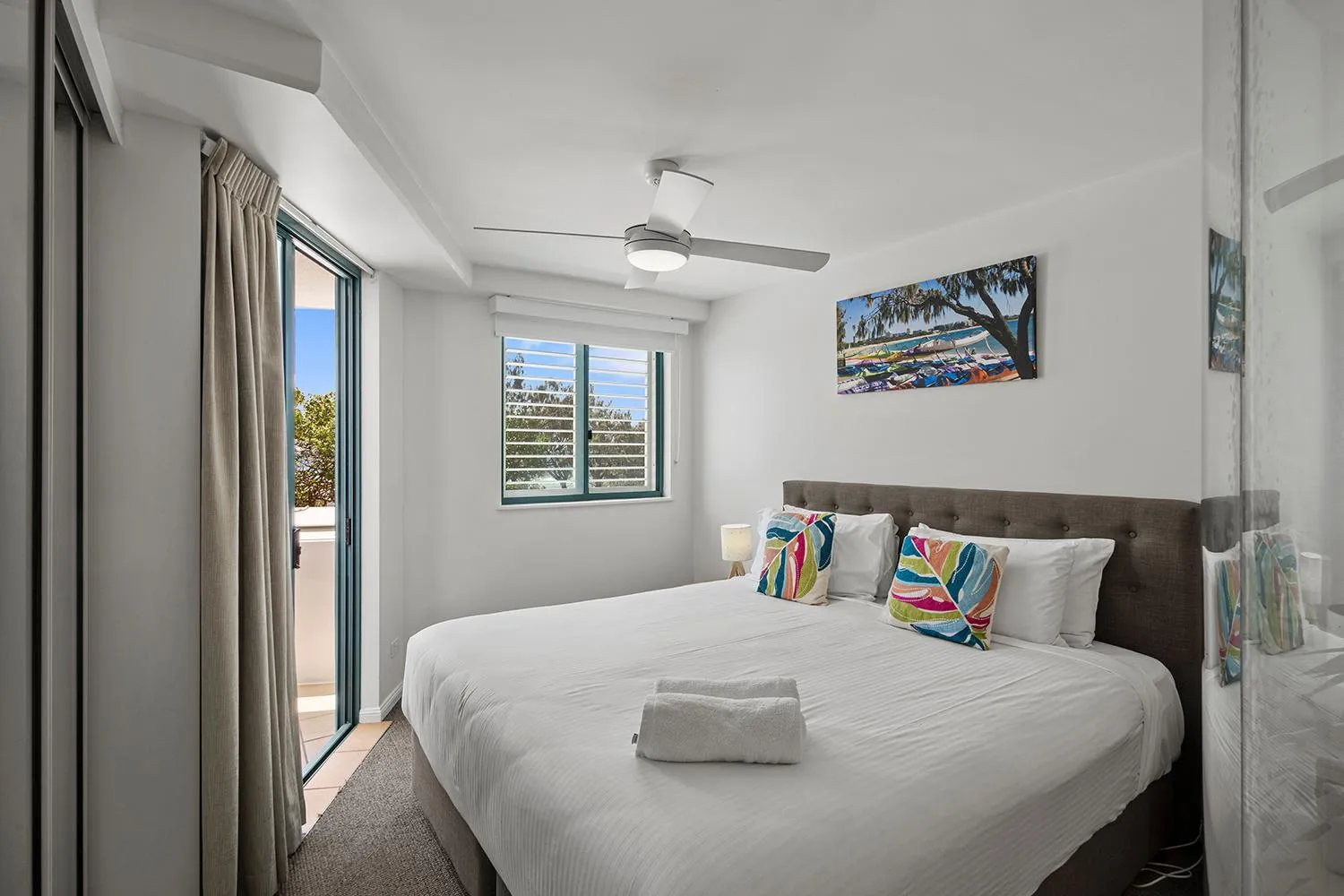 Bed in Grand Palais Boolarong Beachside Apartments