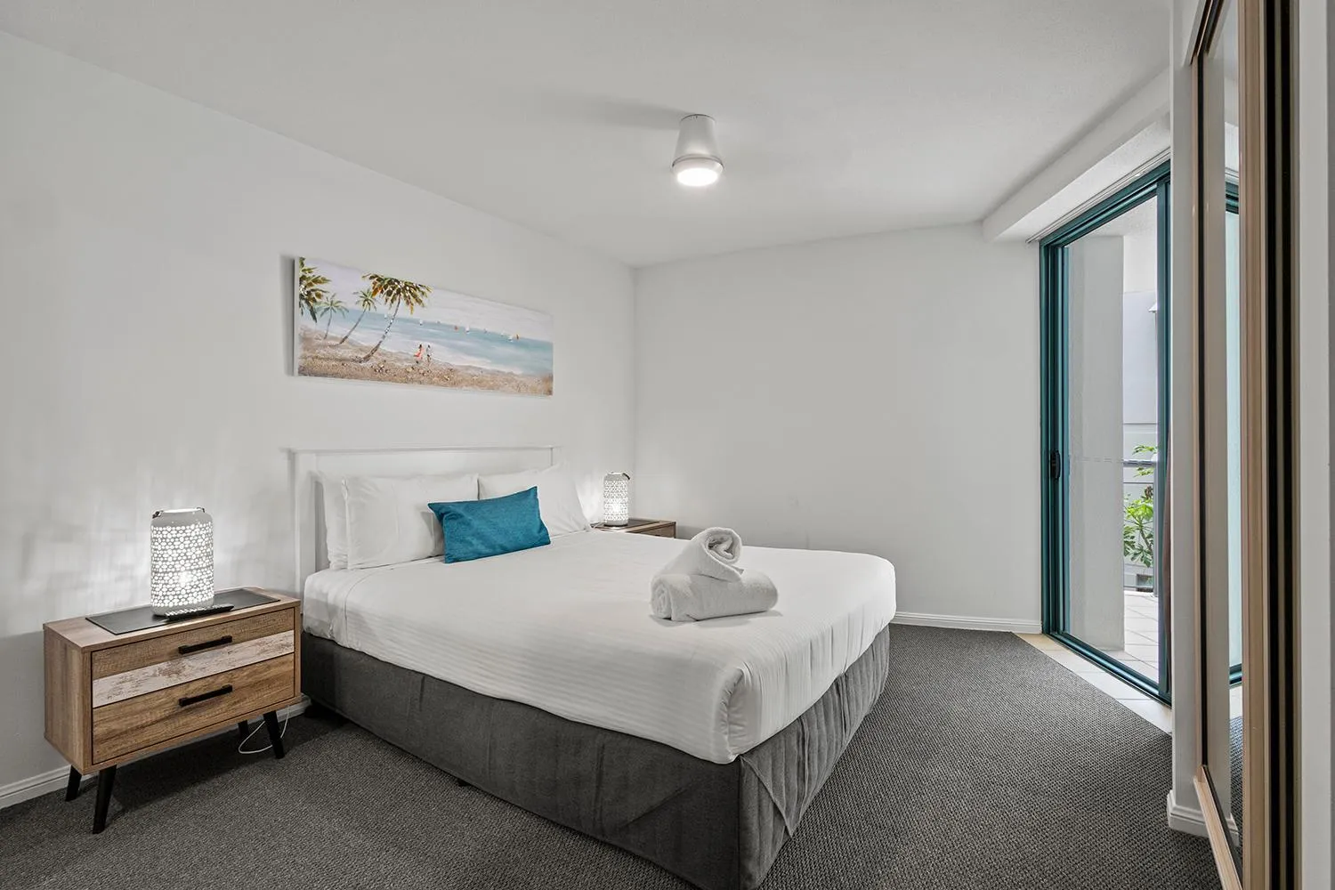 Bed in Grand Palais Boolarong Beachside Apartments