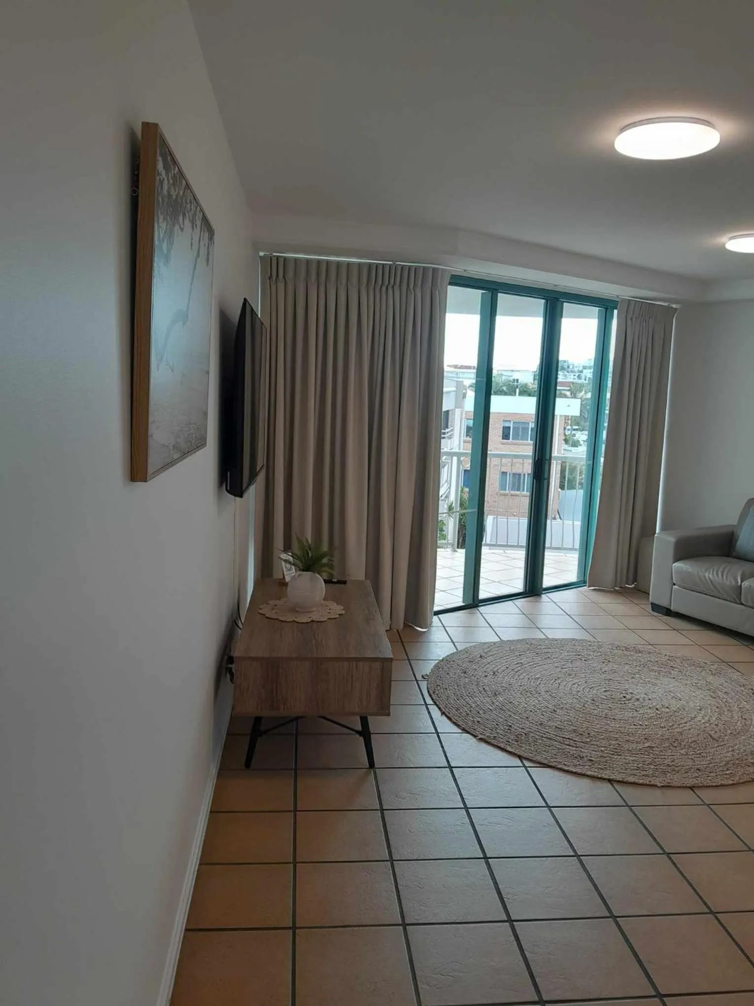 Bed in Grand Palais Boolarong Beachside Apartments