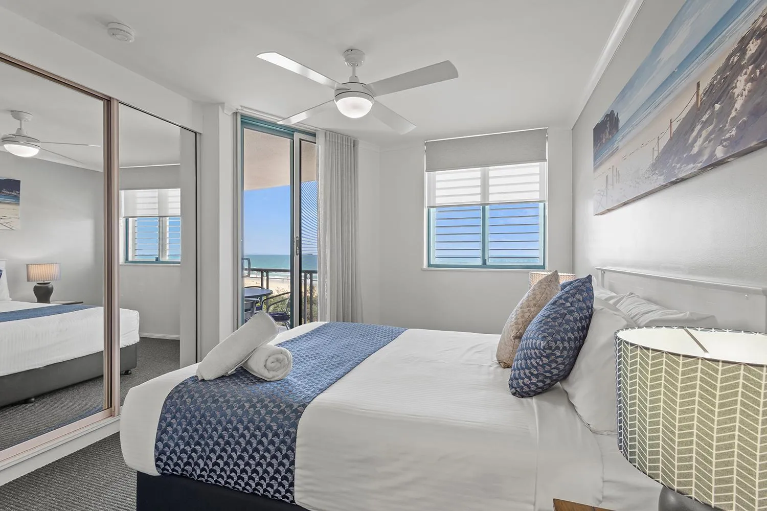 Bed in Grand Palais Boolarong Beachside Apartments