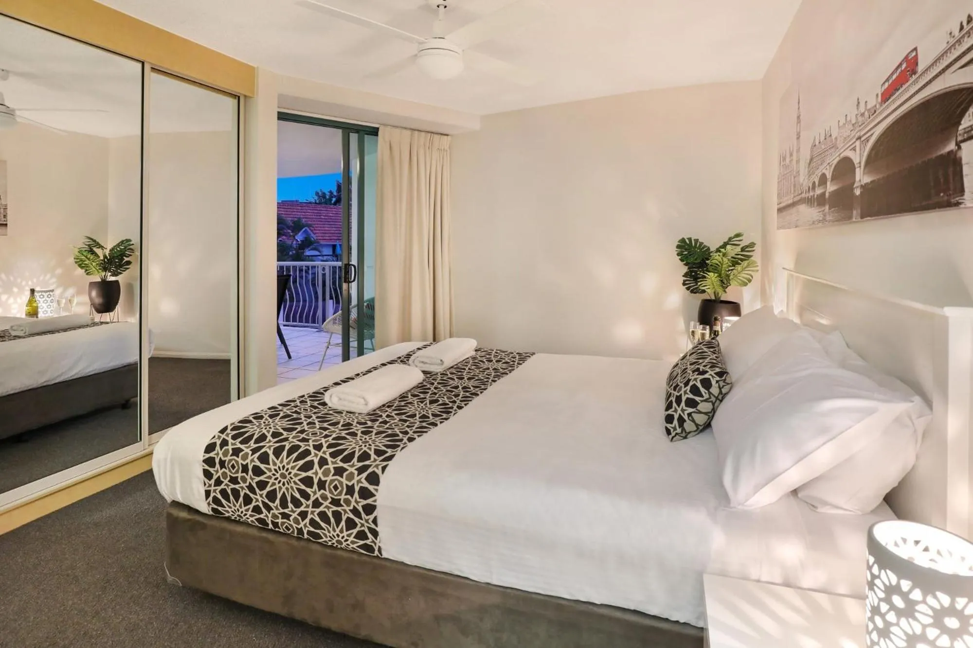 Bed in Grand Palais Boolarong Beachside Apartments