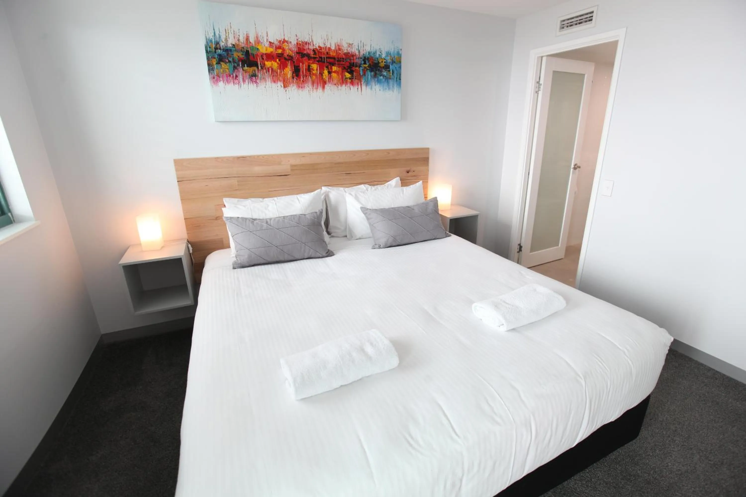 Bedroom, Bed in Grand Palais Boolarong Beachside Apartments