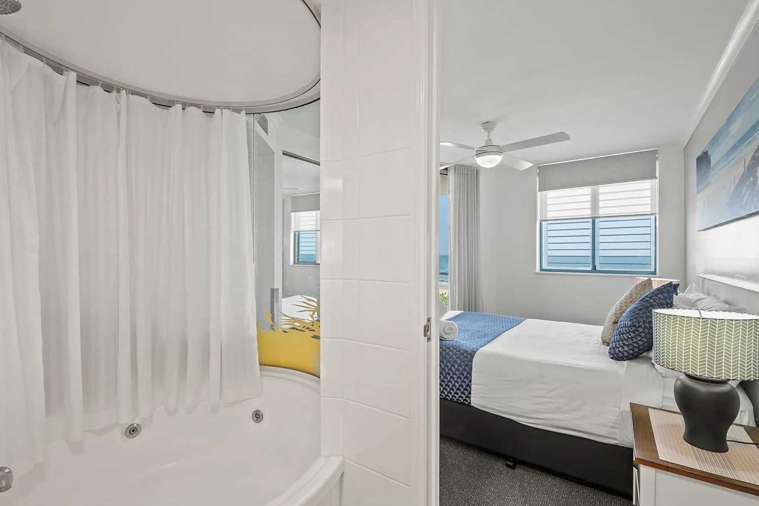 Bed in Grand Palais Boolarong Beachside Apartments