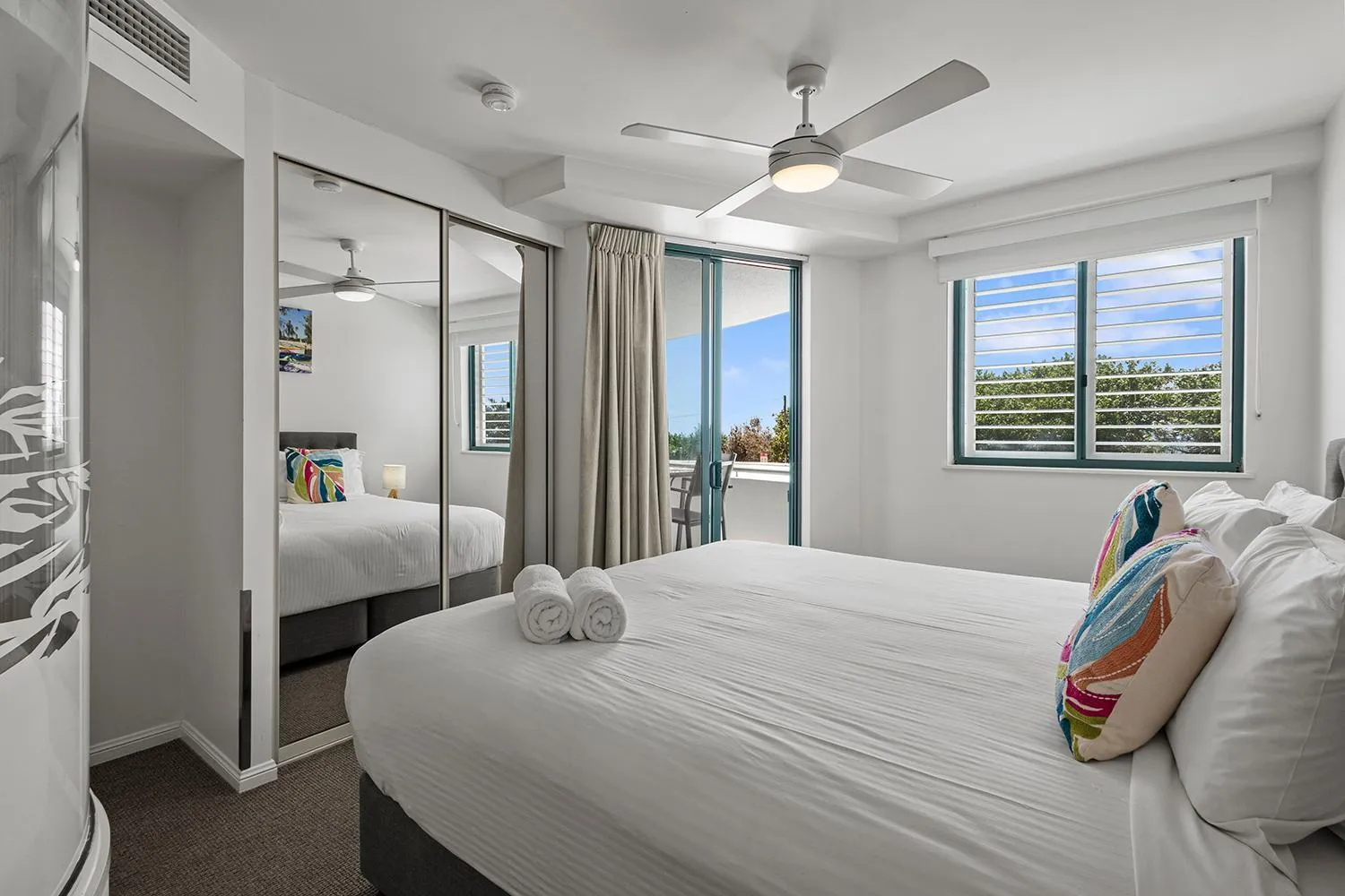 Bed in Grand Palais Boolarong Beachside Apartments