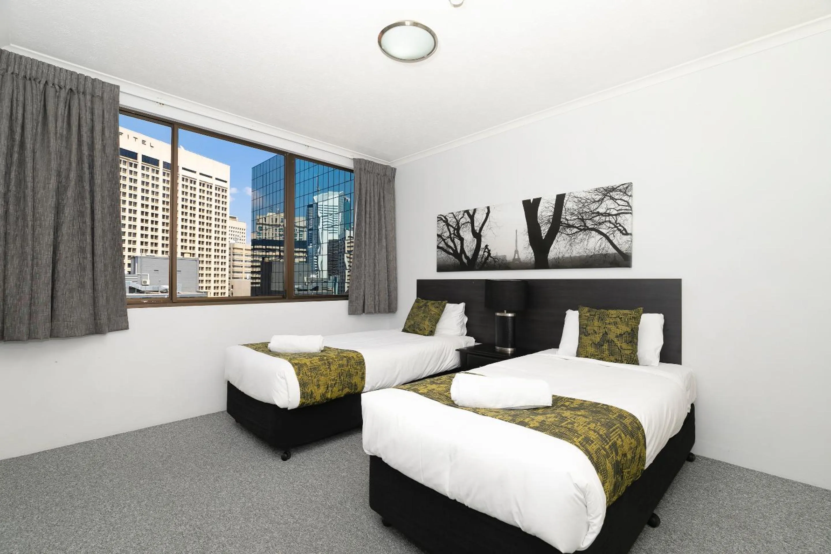 Bed in The Astor Apartments