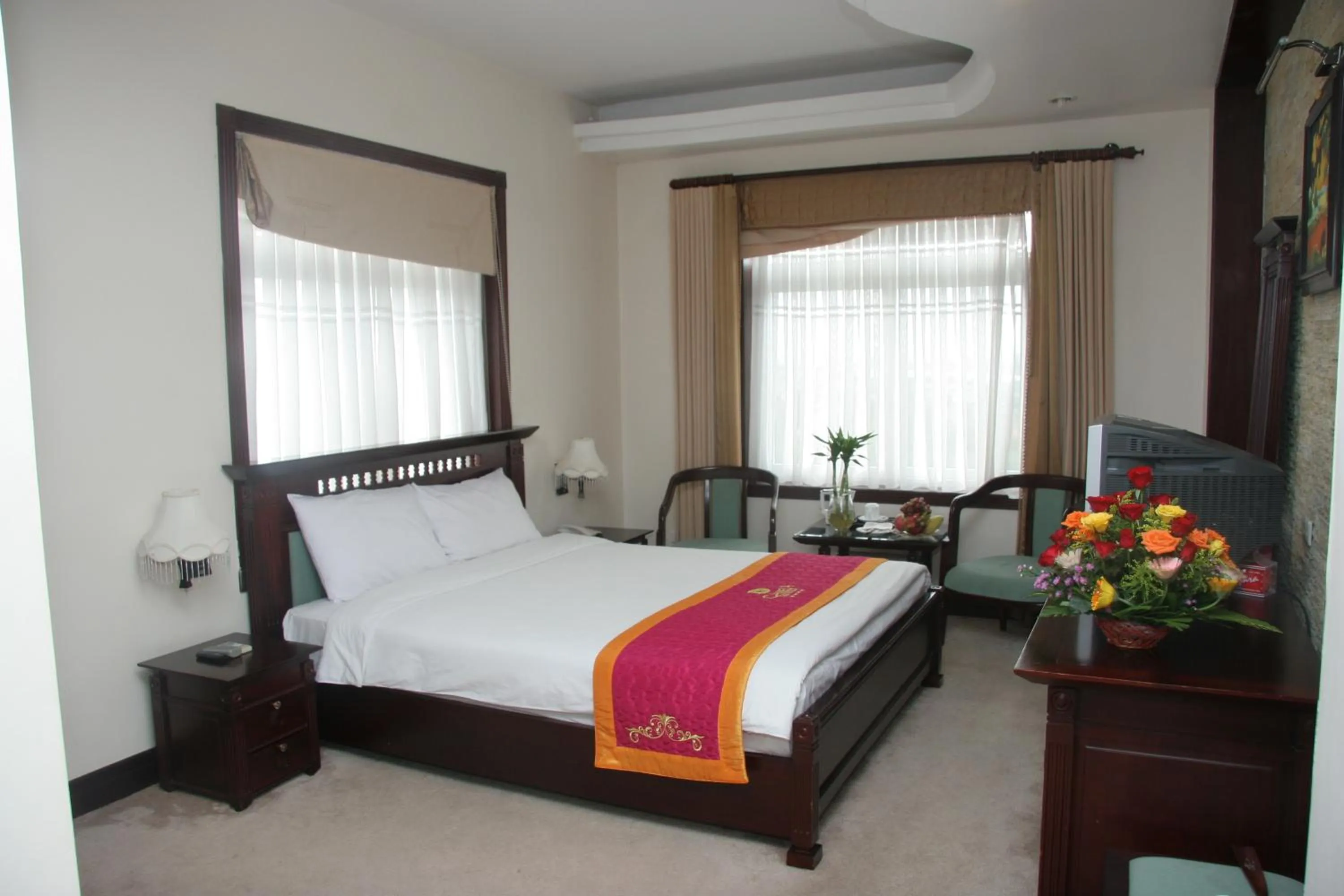 Bed in Camela Hotel & Resort
