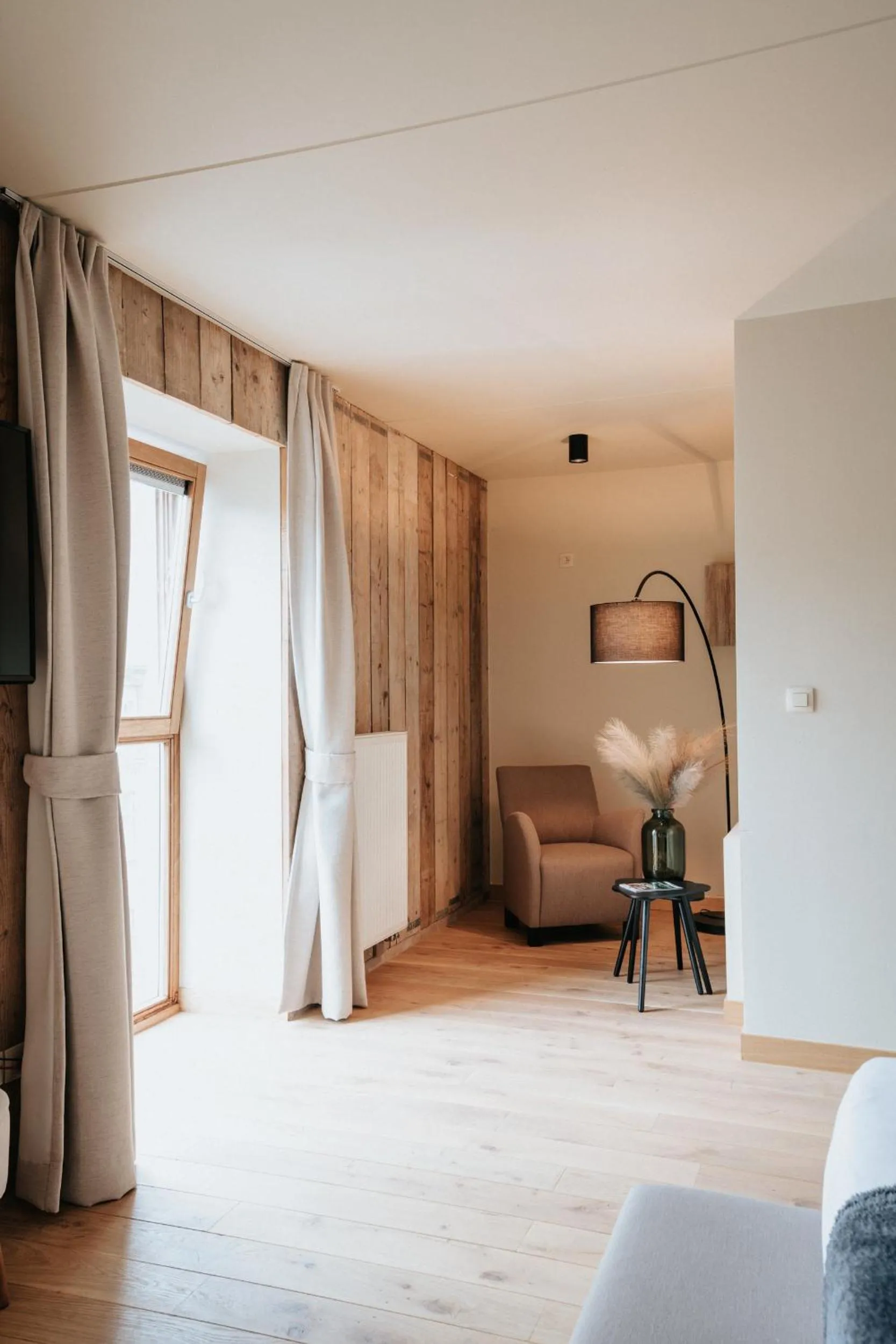 Seating area, Bed in La Merveilleuse by Infiniti hôtel