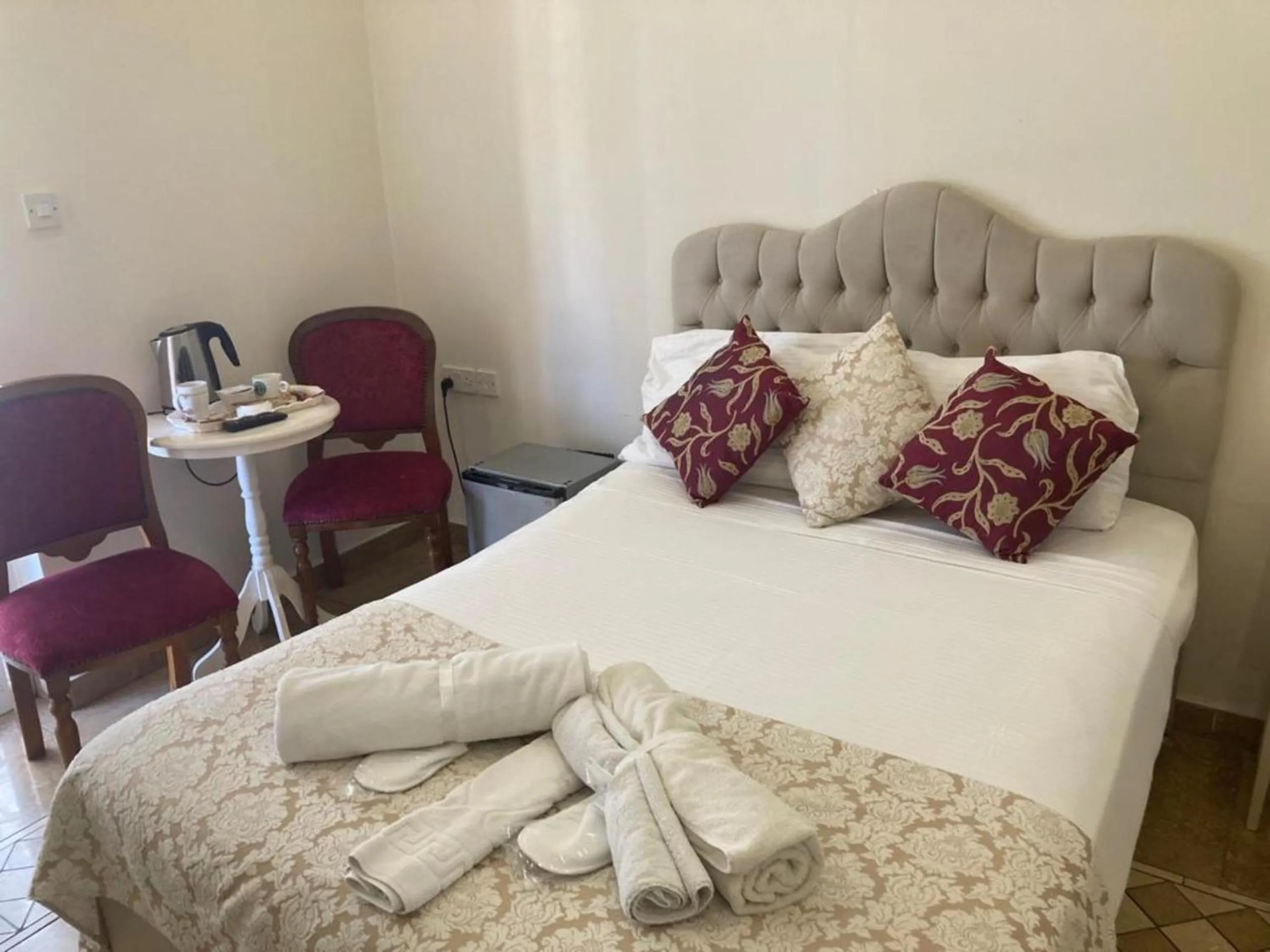 Bed in Lord's Residence Boutique Hotel