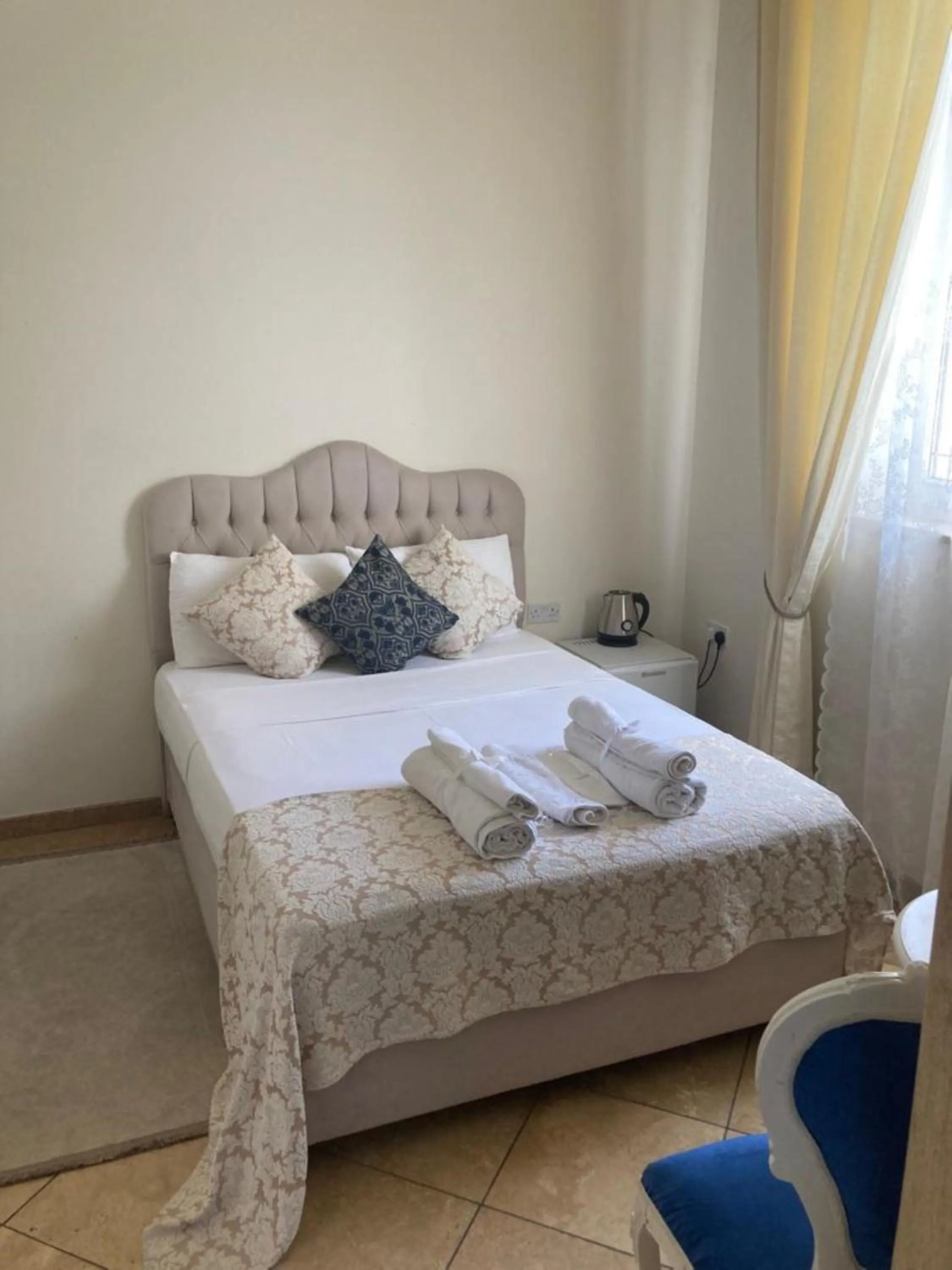 Bed in Lord's Residence Boutique Hotel