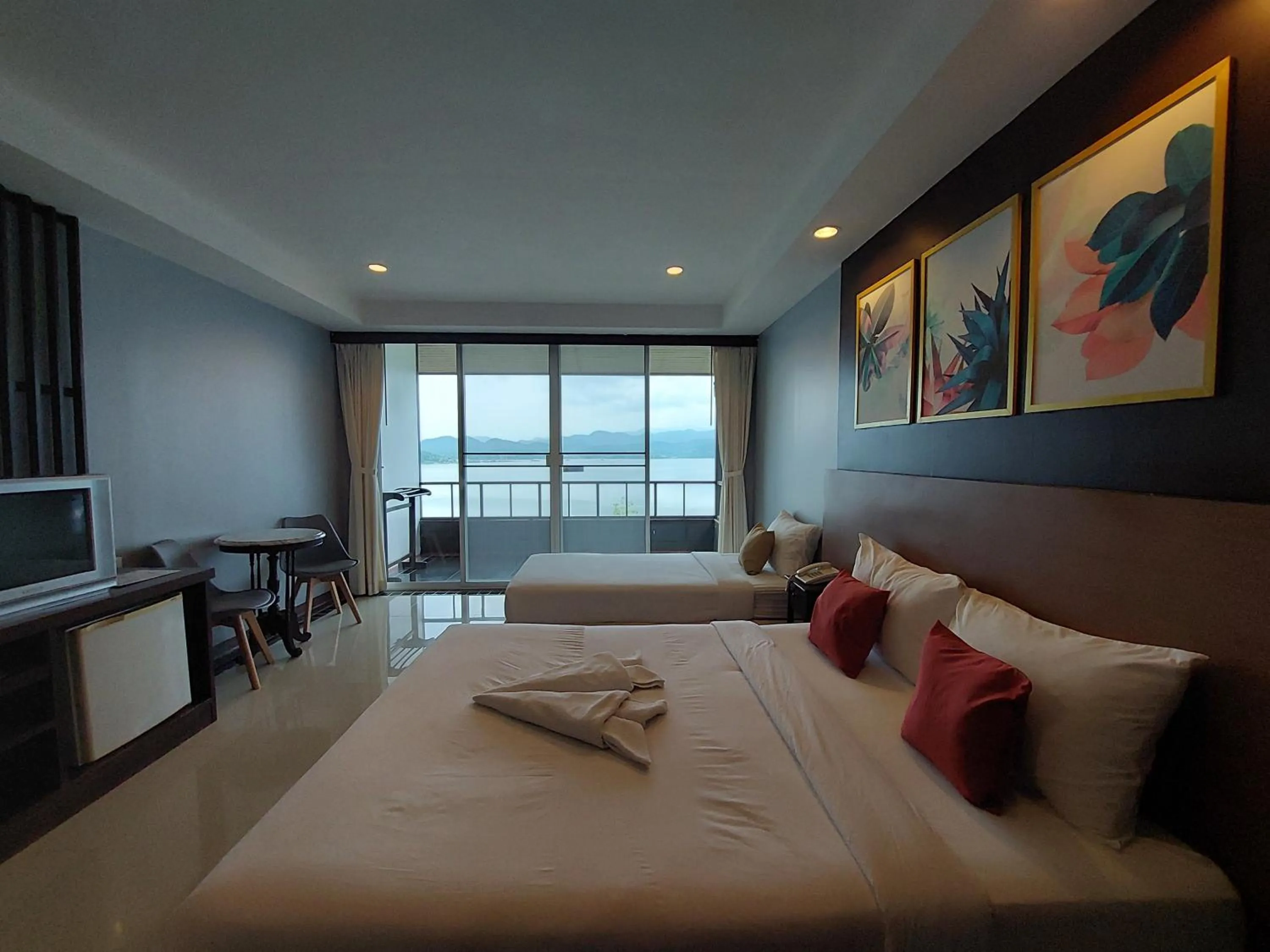 Bed in Raya Buri Resort Kanchanaburi