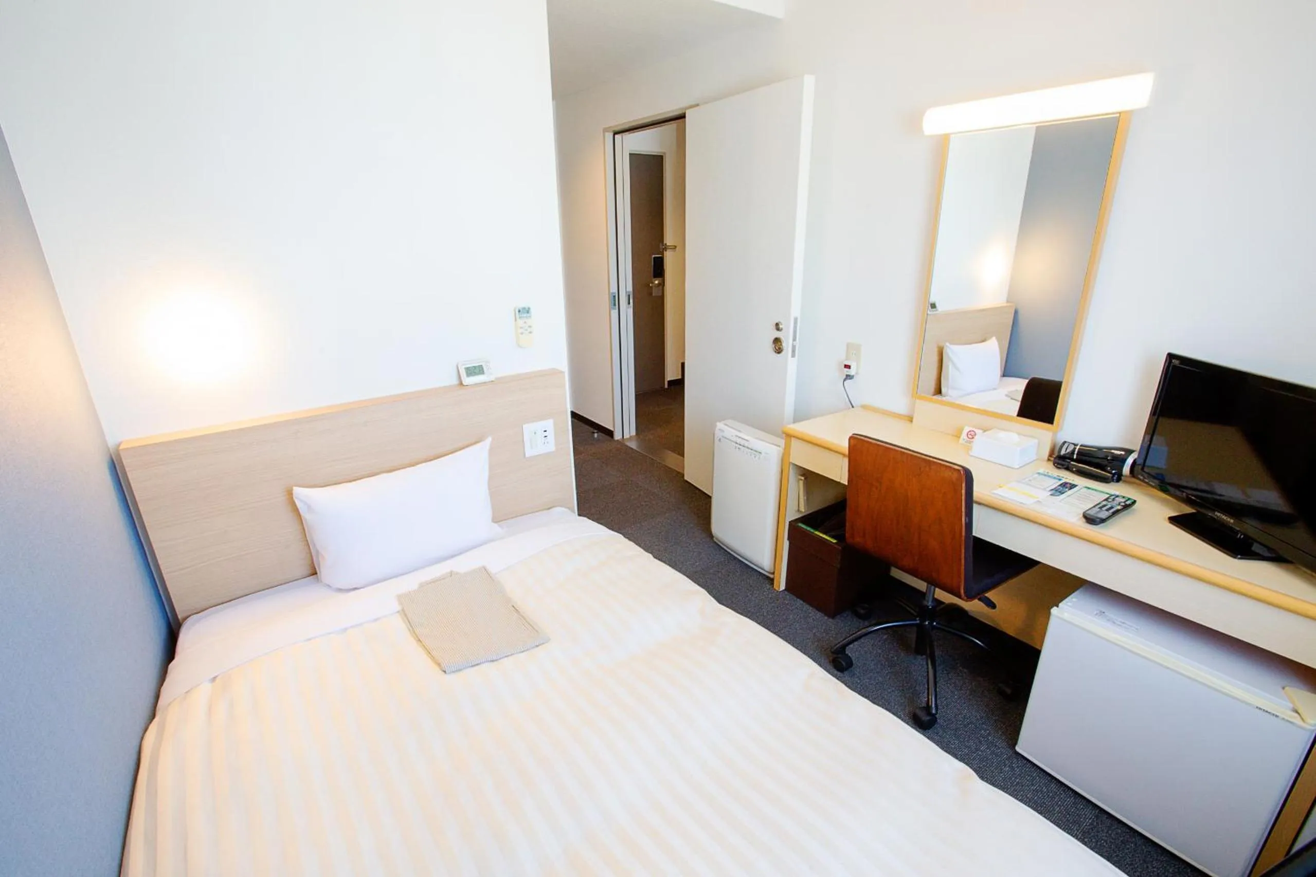 Bed in Super Hotel Matsuyama