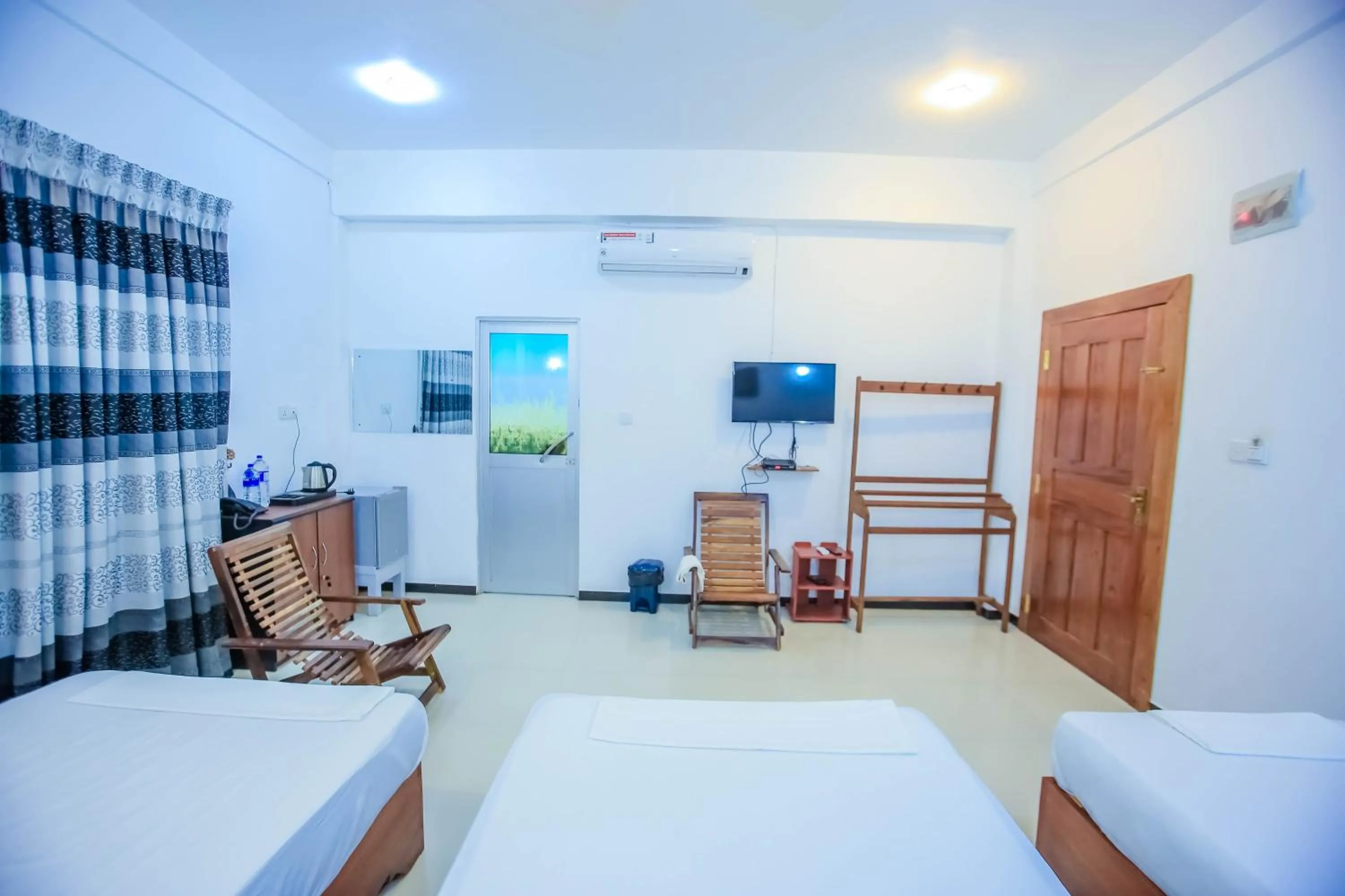 Living room, Bed in Sunstar Nilaveli