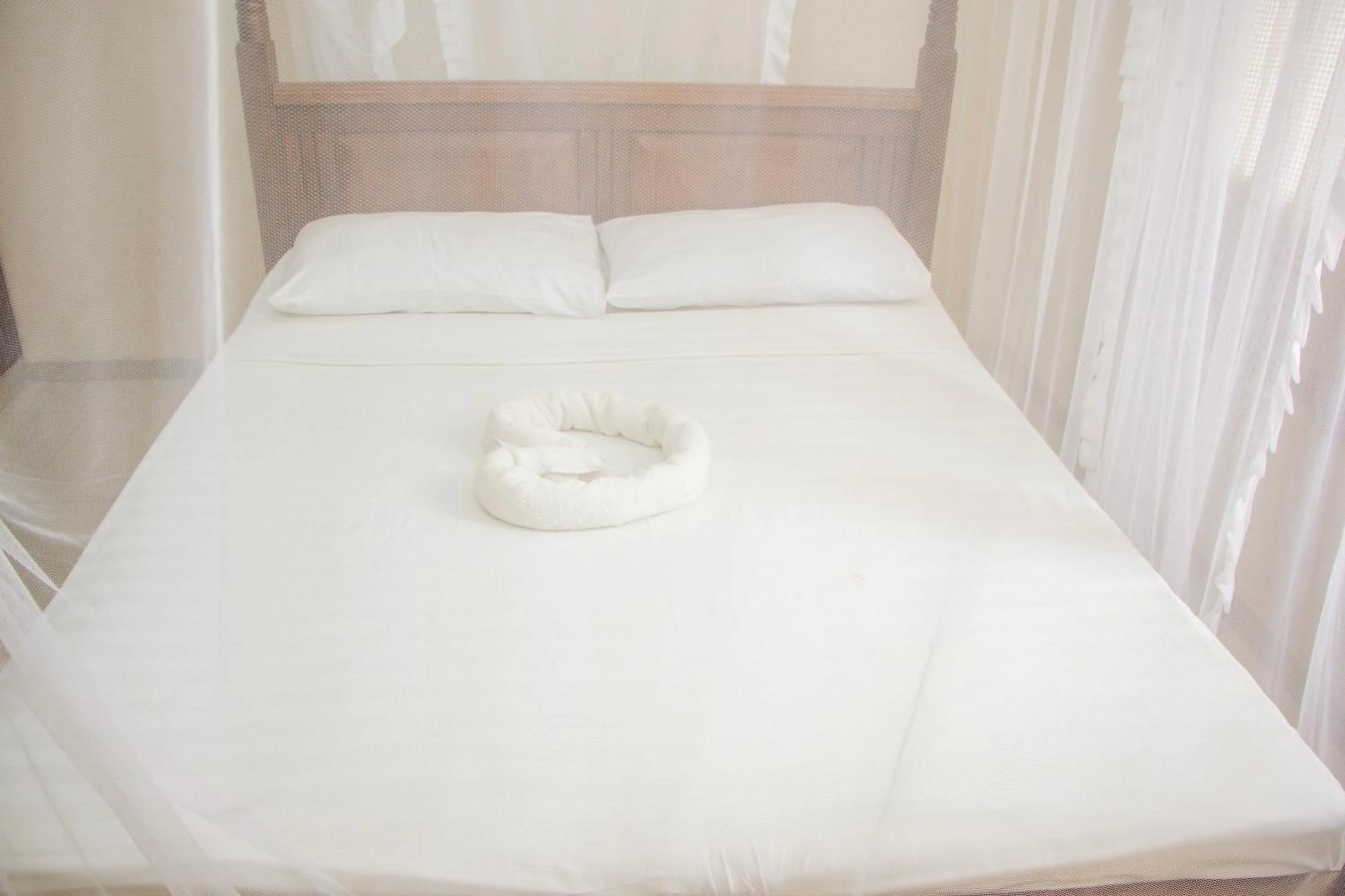 Bed in Nightingale Apartments Hotel Mombasa