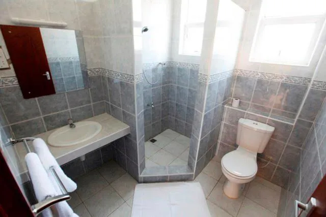 Shower in Nightingale Apartments Hotel Mombasa