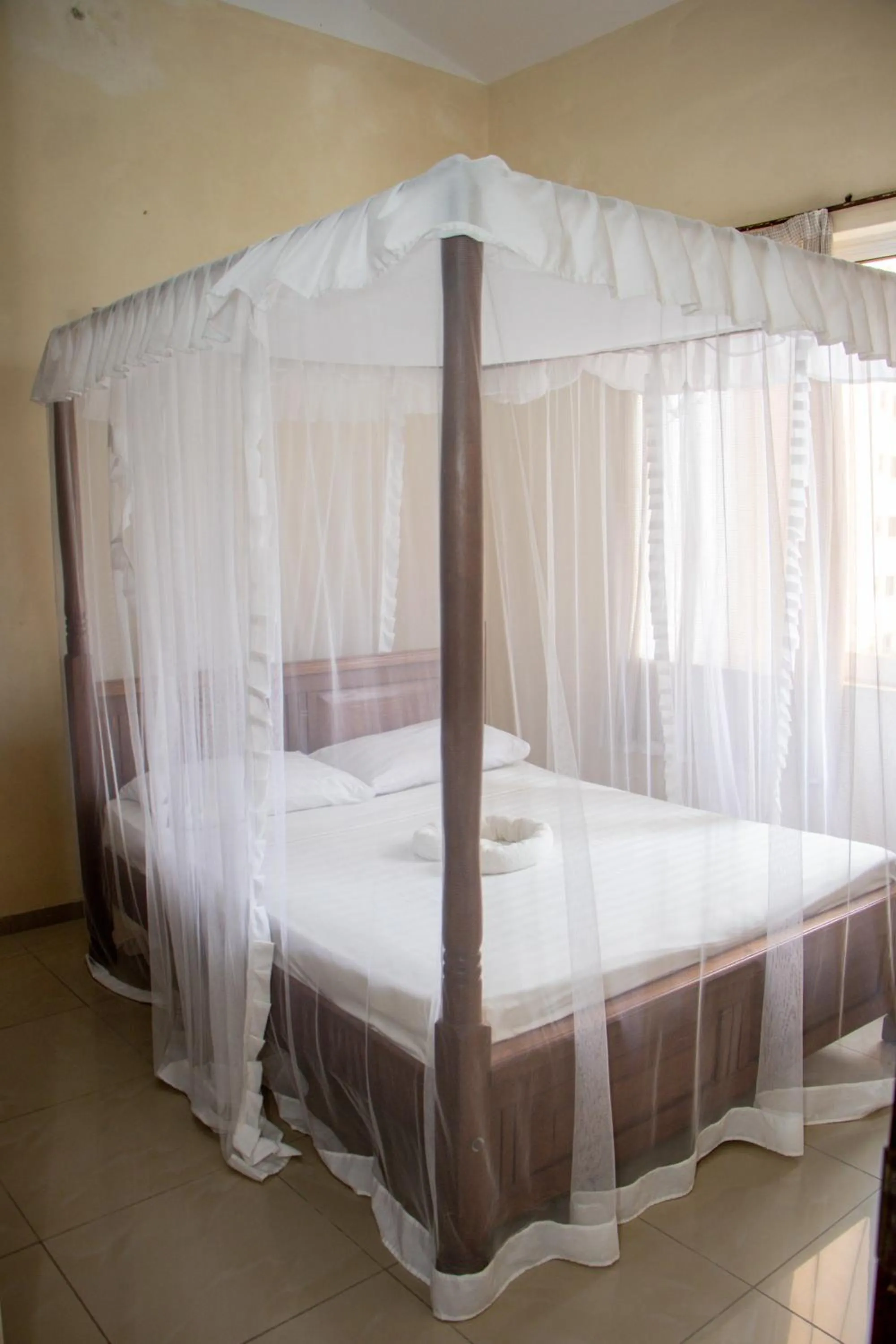 Bed in Nightingale Apartments Hotel Mombasa