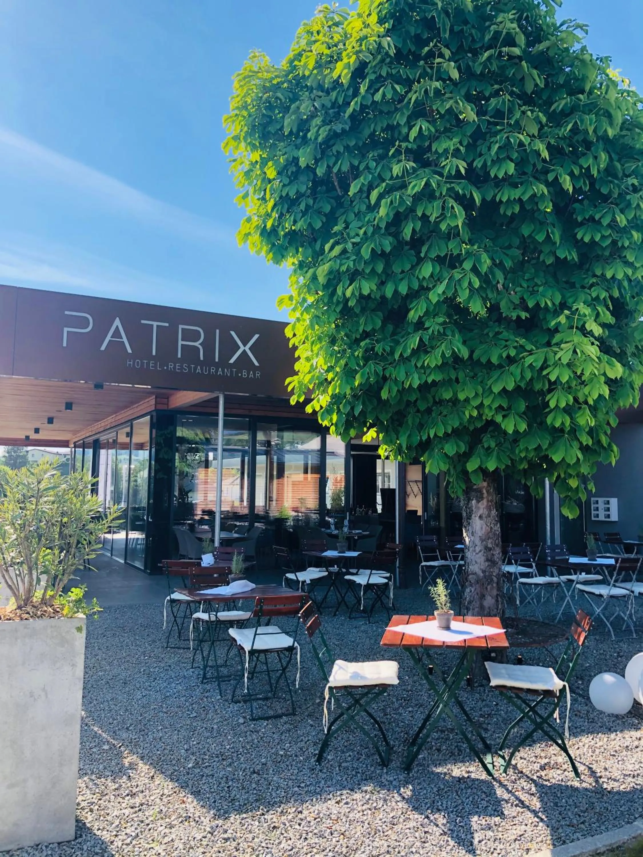 Garden in Patrix Hotel, Restaurant, Bar