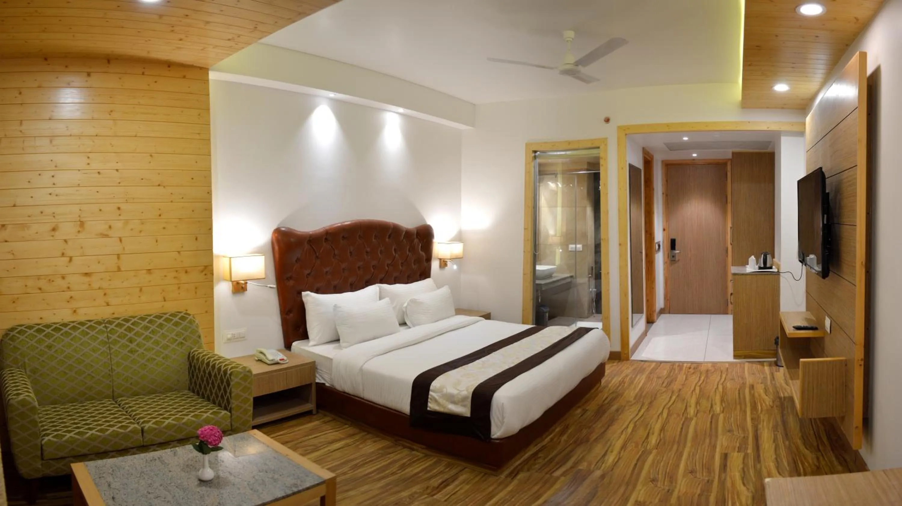 Photo of the whole room, Bed in The Orchard Greens Resort - A Centrally Heated Property