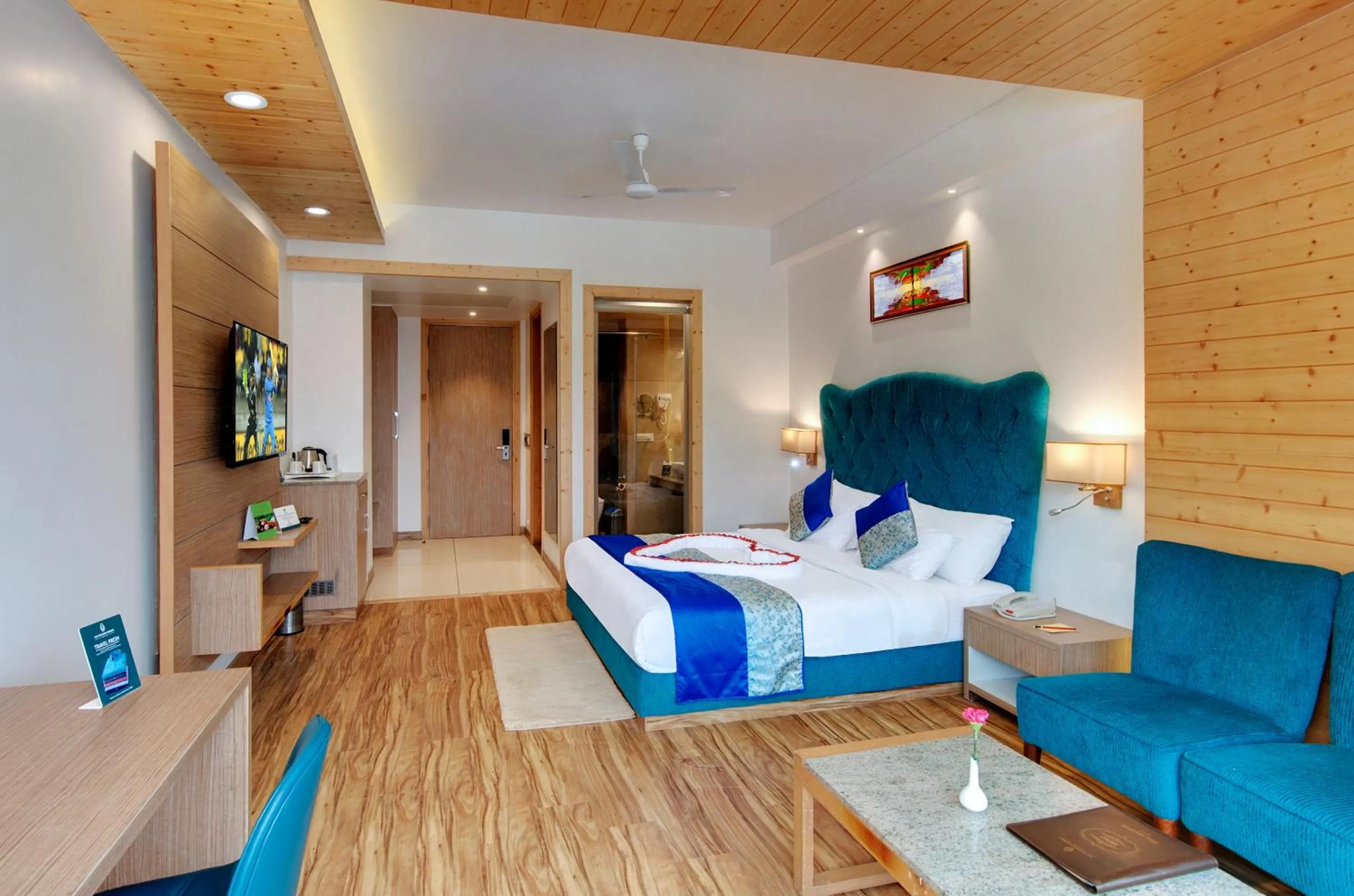 Photo of the whole room, Bed in The Orchard Greens Resort - A Centrally Heated Property