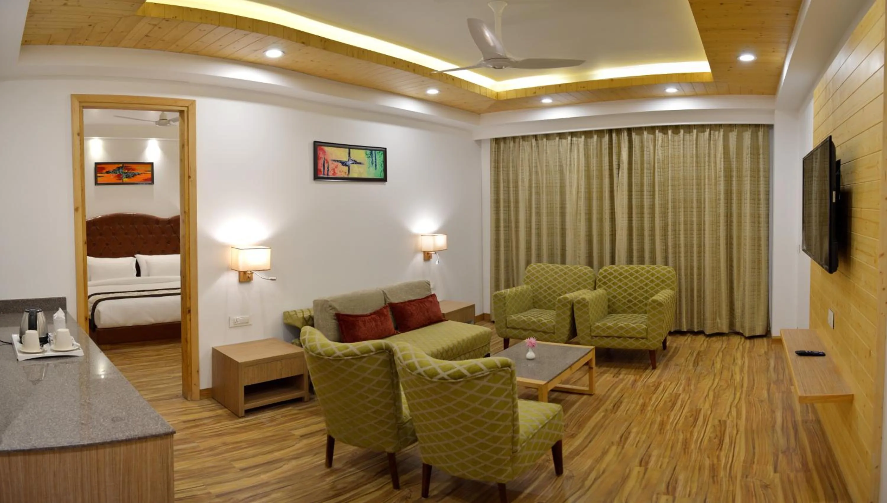 Photo of the whole room, Bed in The Orchard Greens Resort - A Centrally Heated Property