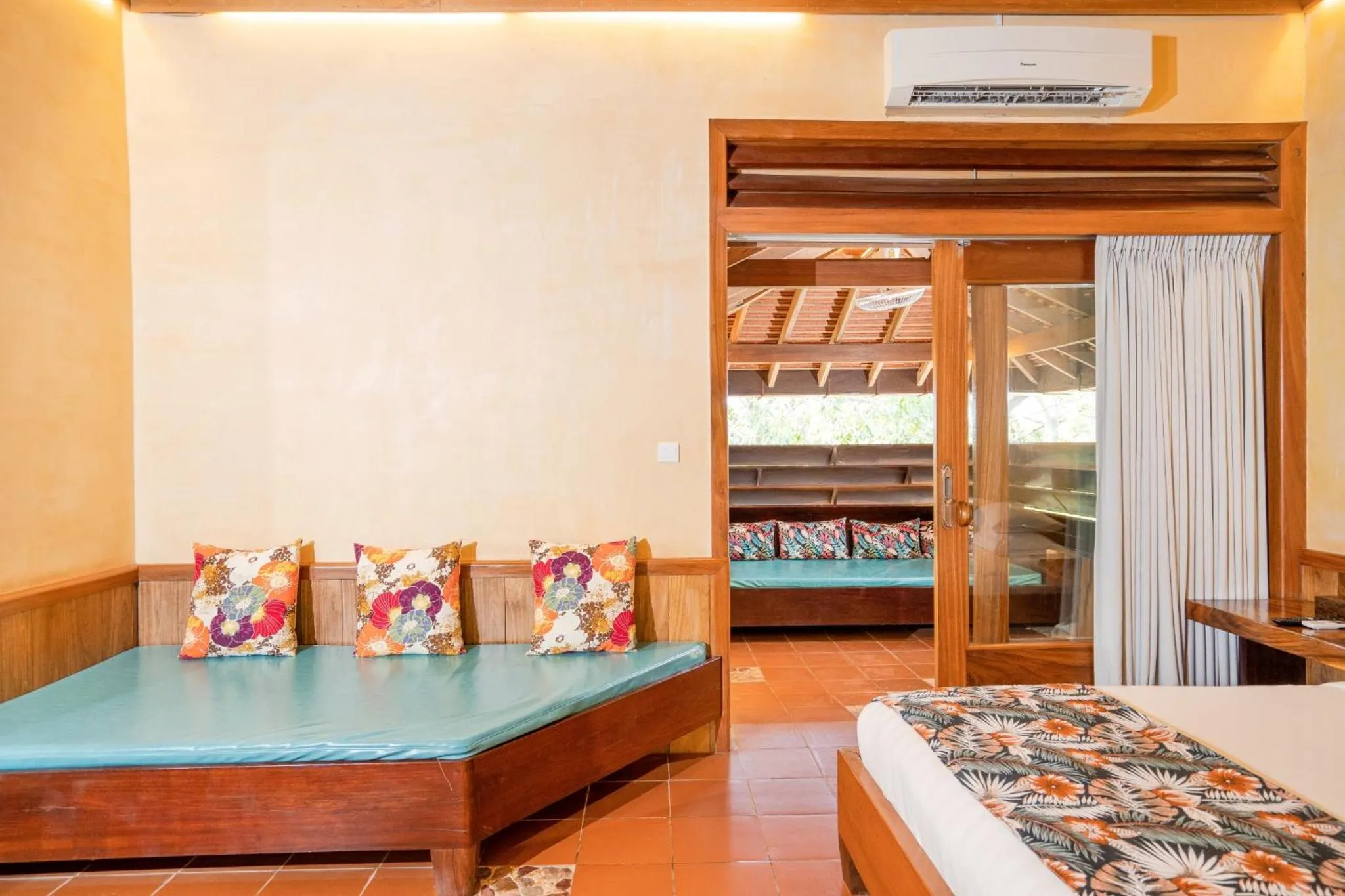 Seating area, Bed in Veranda Natural Resort