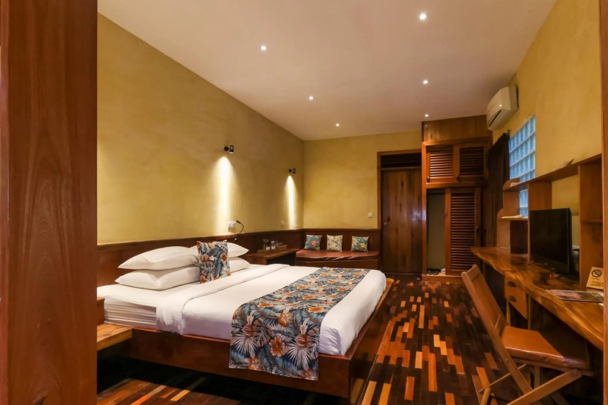 Bed in Veranda Natural Resort