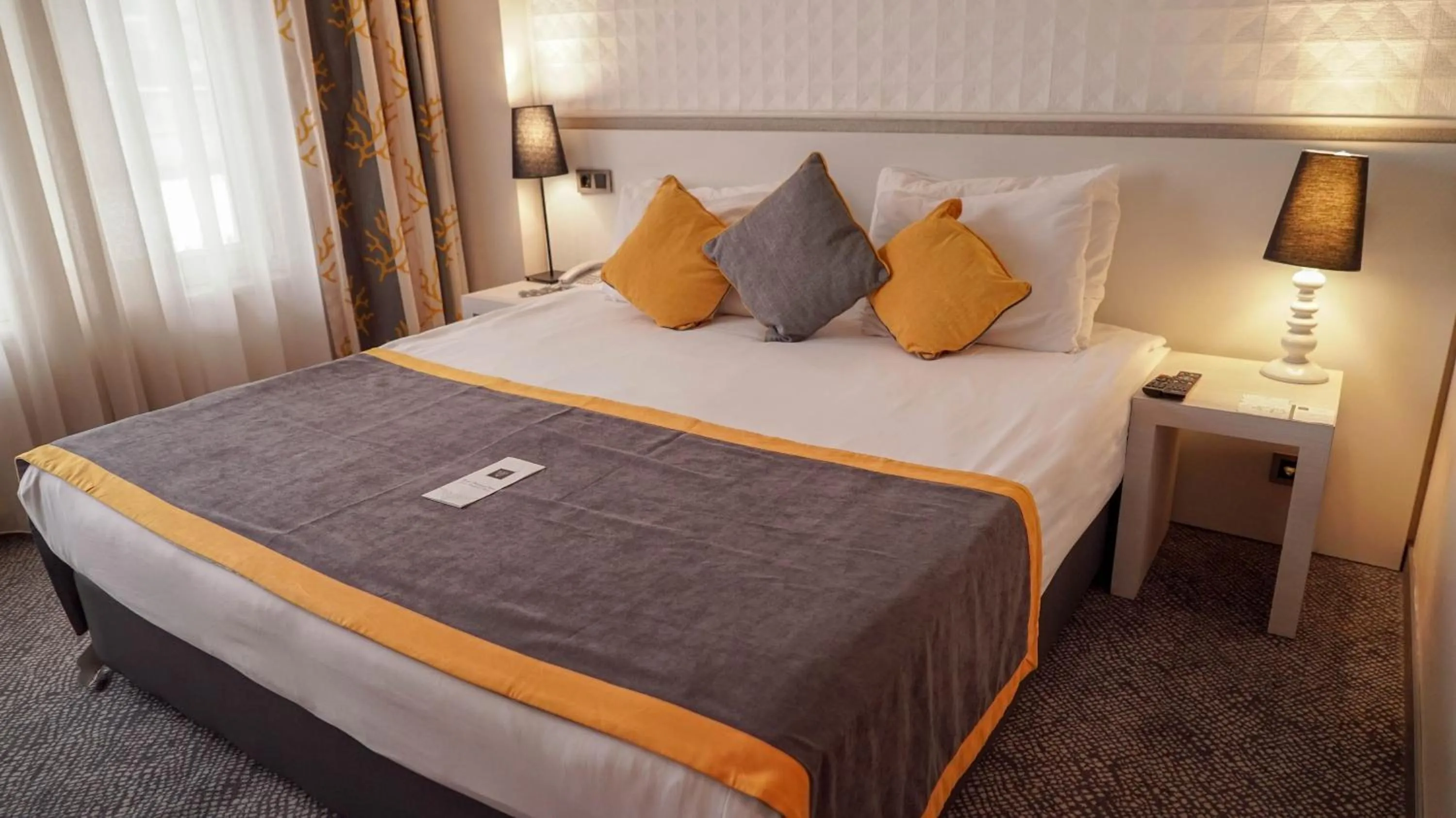 Bed in Koza Suite Hotel