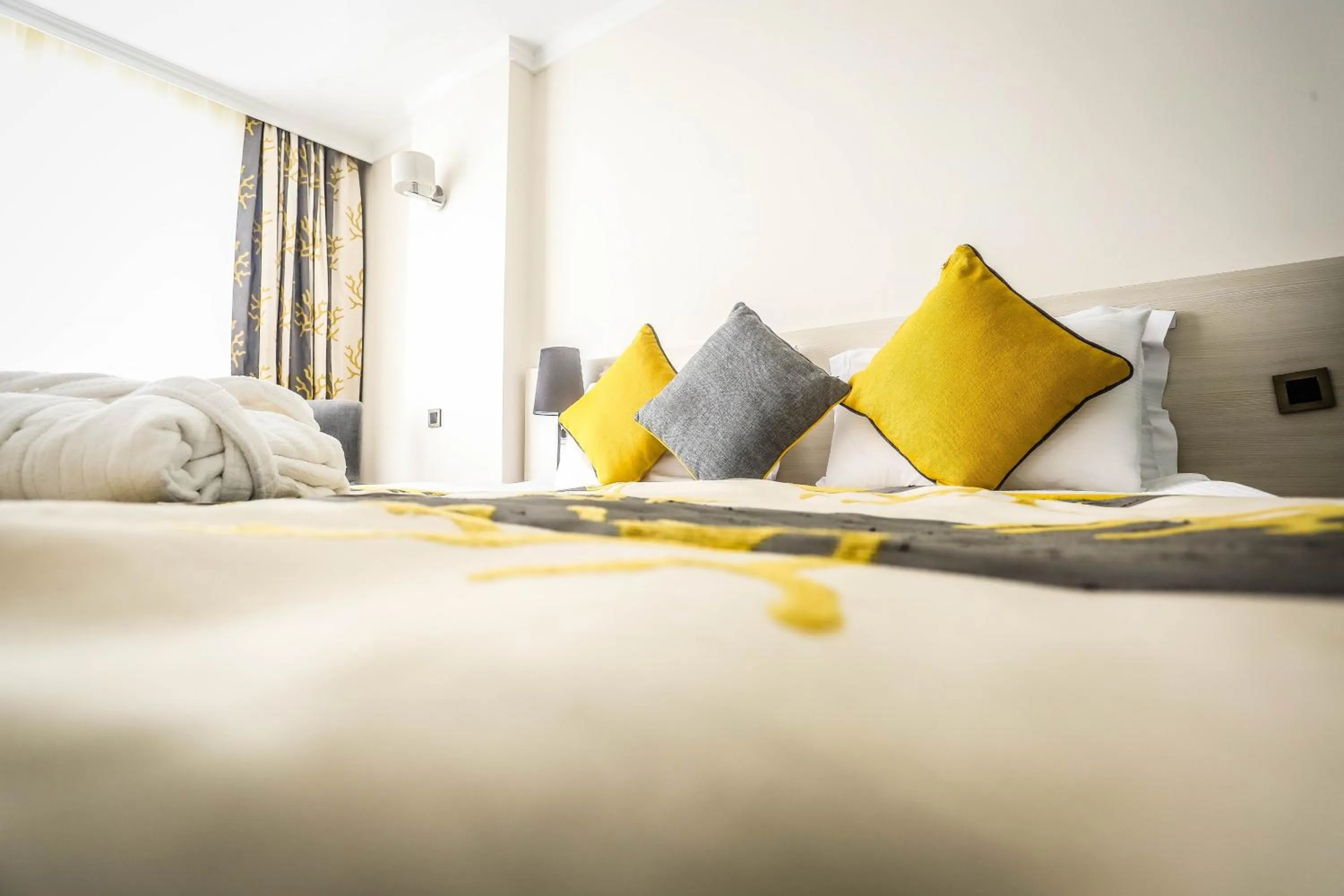 Bed in Koza Suite Hotel