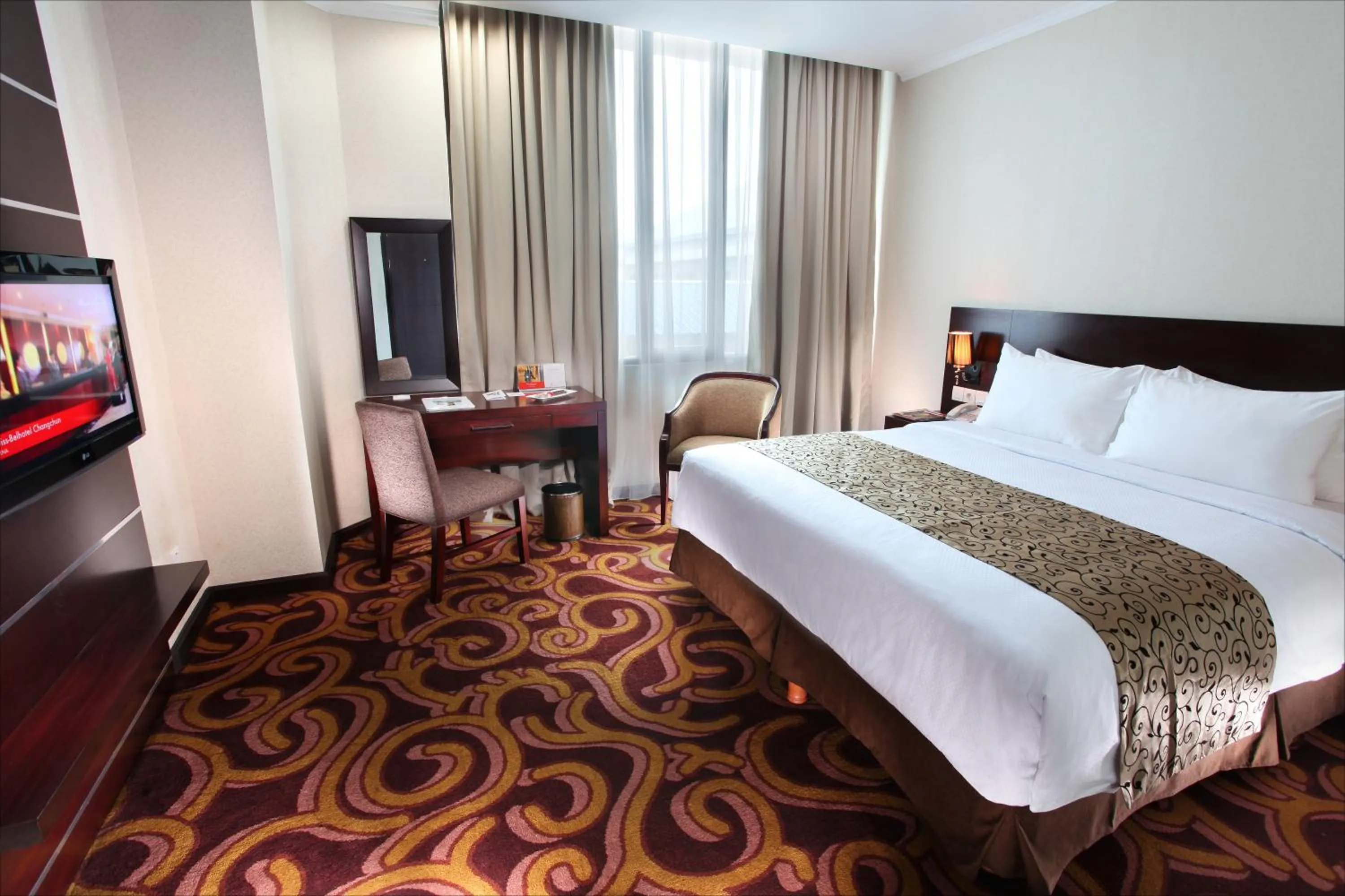 Decorative detail, Bed in Swiss-Belhotel Merauke