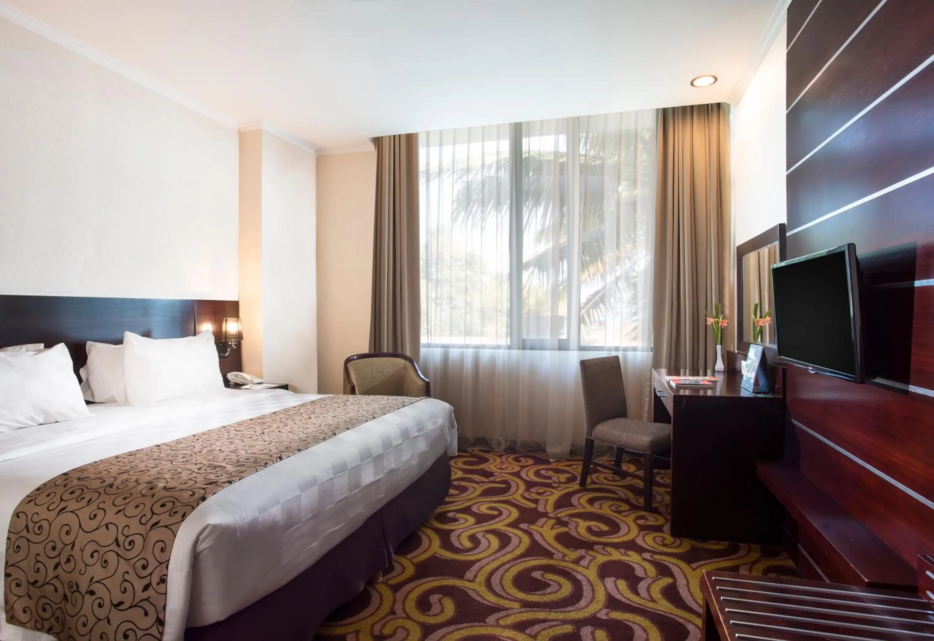 Bed in Swiss-Belhotel Merauke