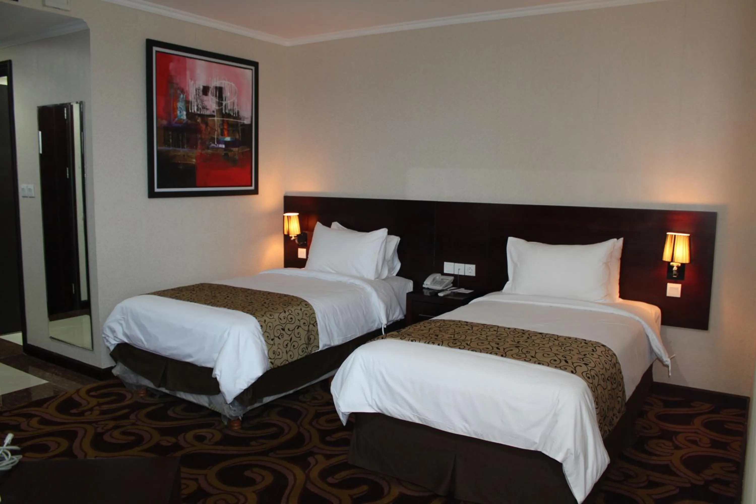 Bed in Swiss-Belhotel Merauke