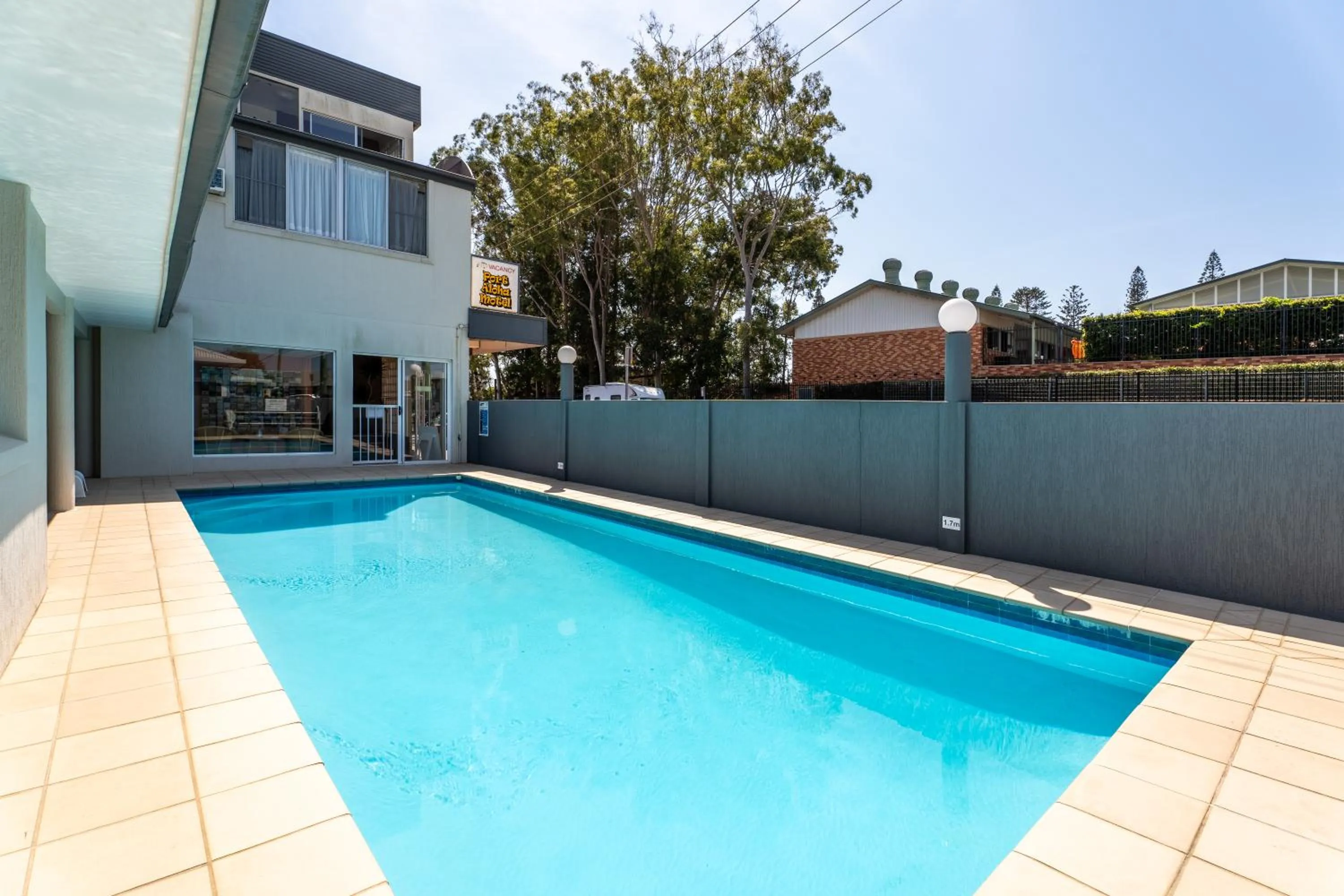 Swimming pool in Port Aloha Motel