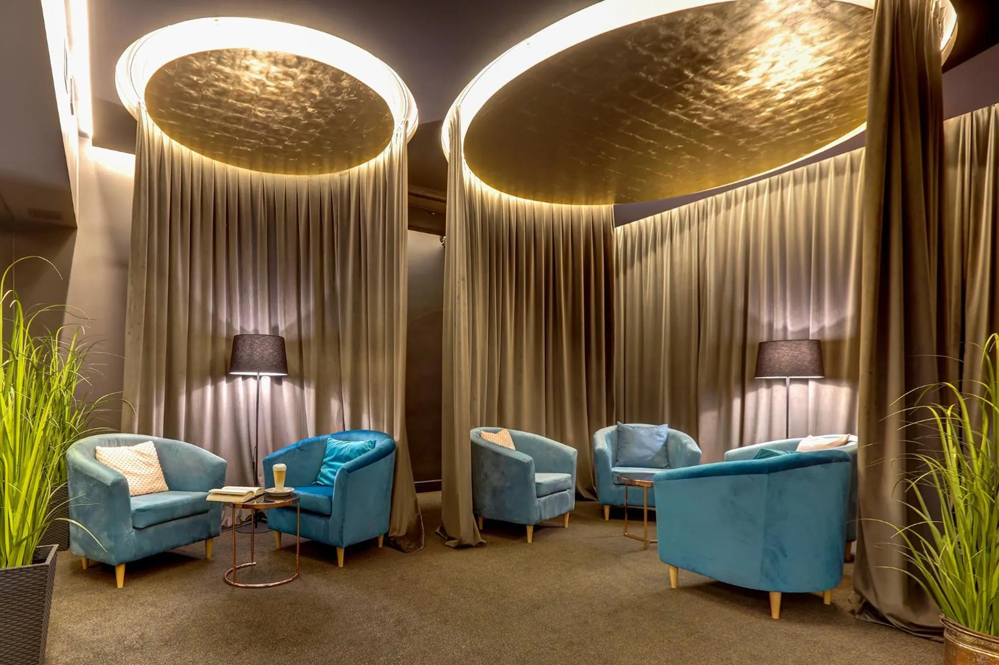 Communal lounge/ TV room in Hotel Afrodyta Business & Spa