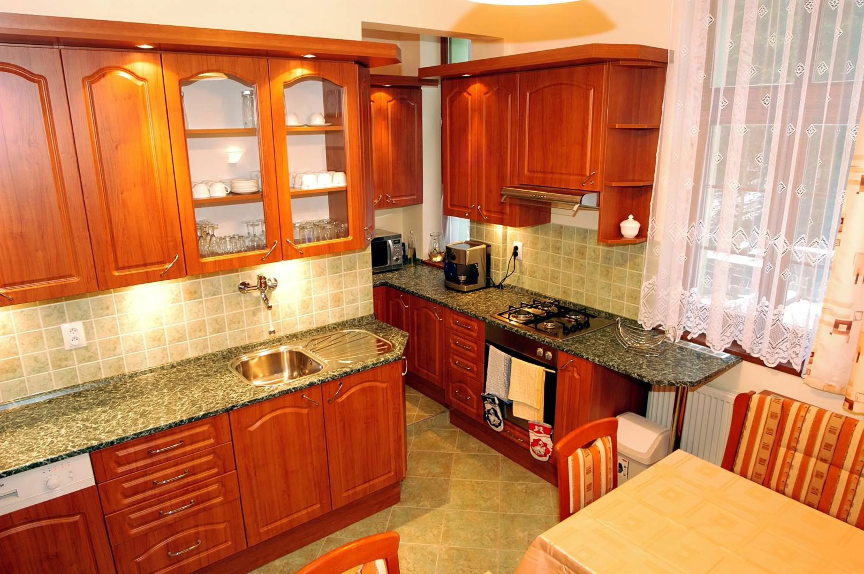 Kitchen or kitchenette in Penzión Zlatý Jeleň