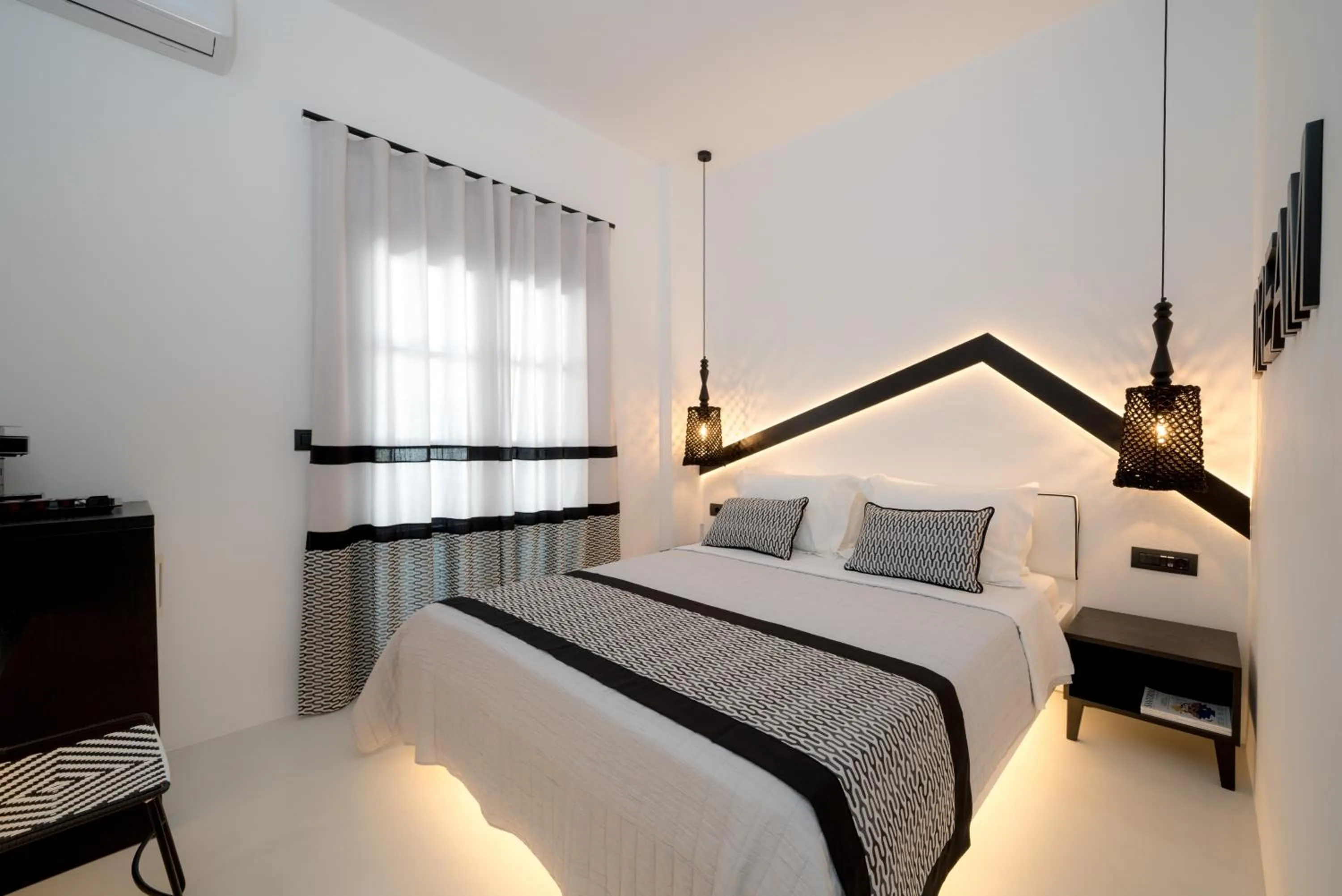 Bed in Divelia Hotel