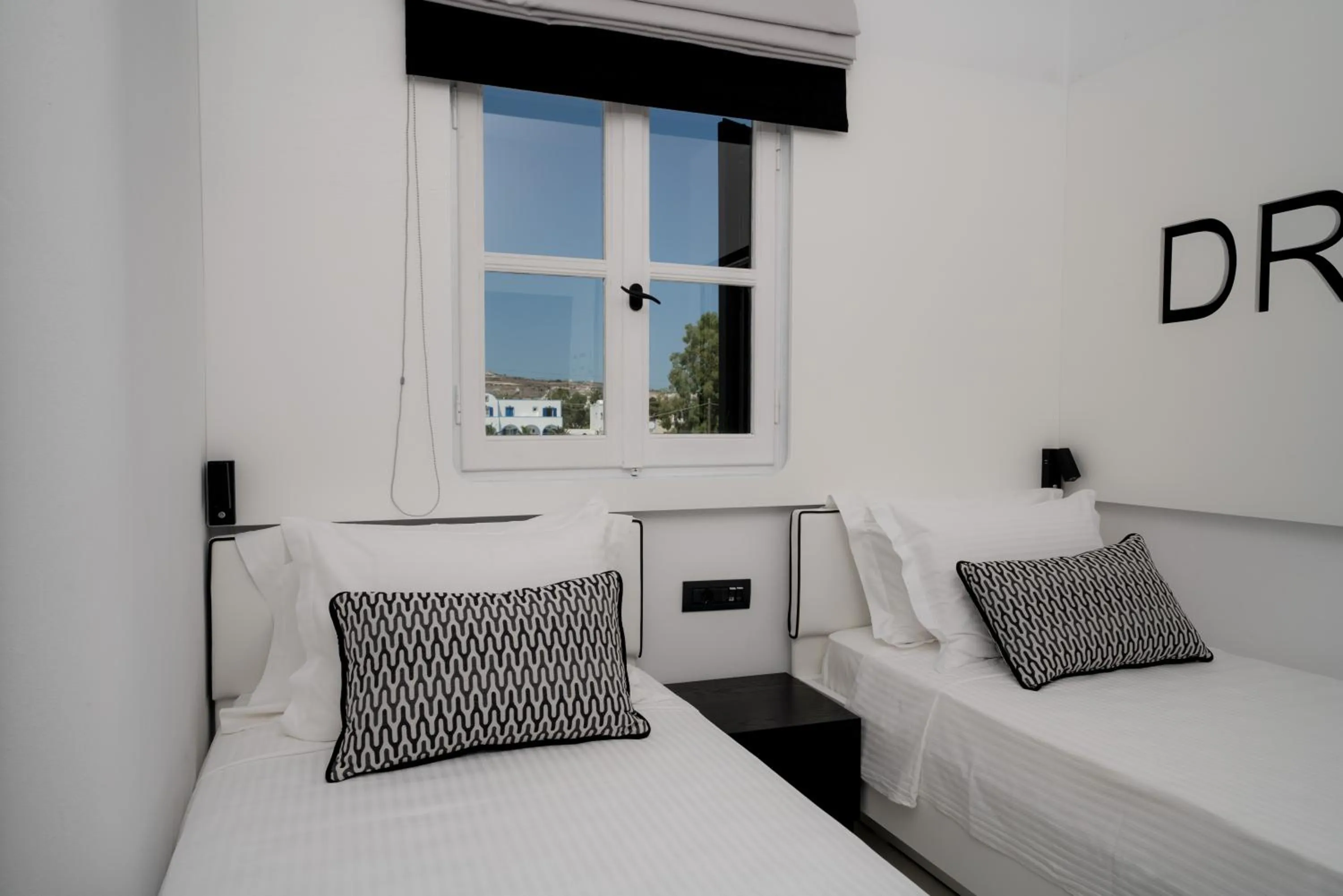 Bed in Divelia Hotel