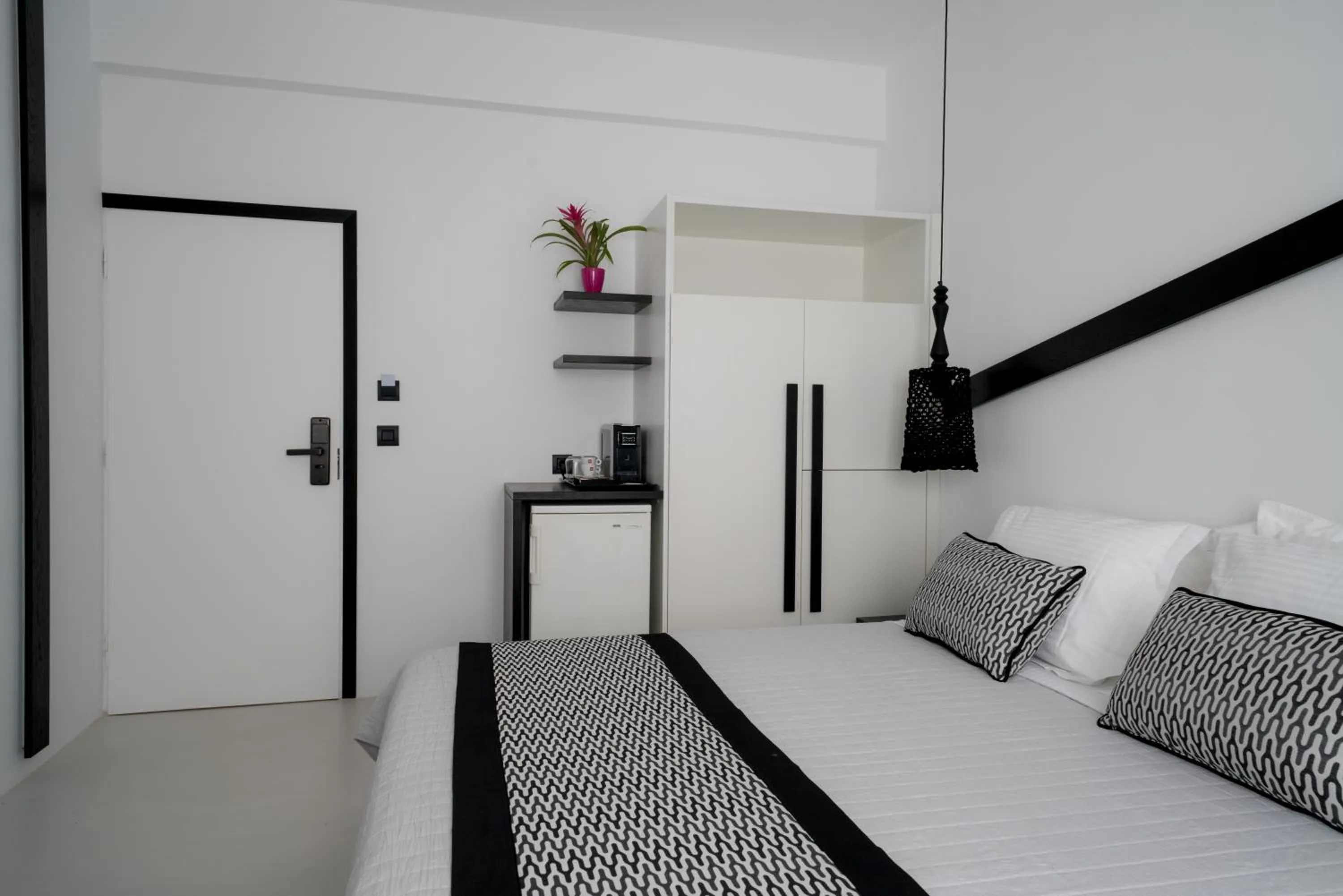 Bed in Divelia Hotel