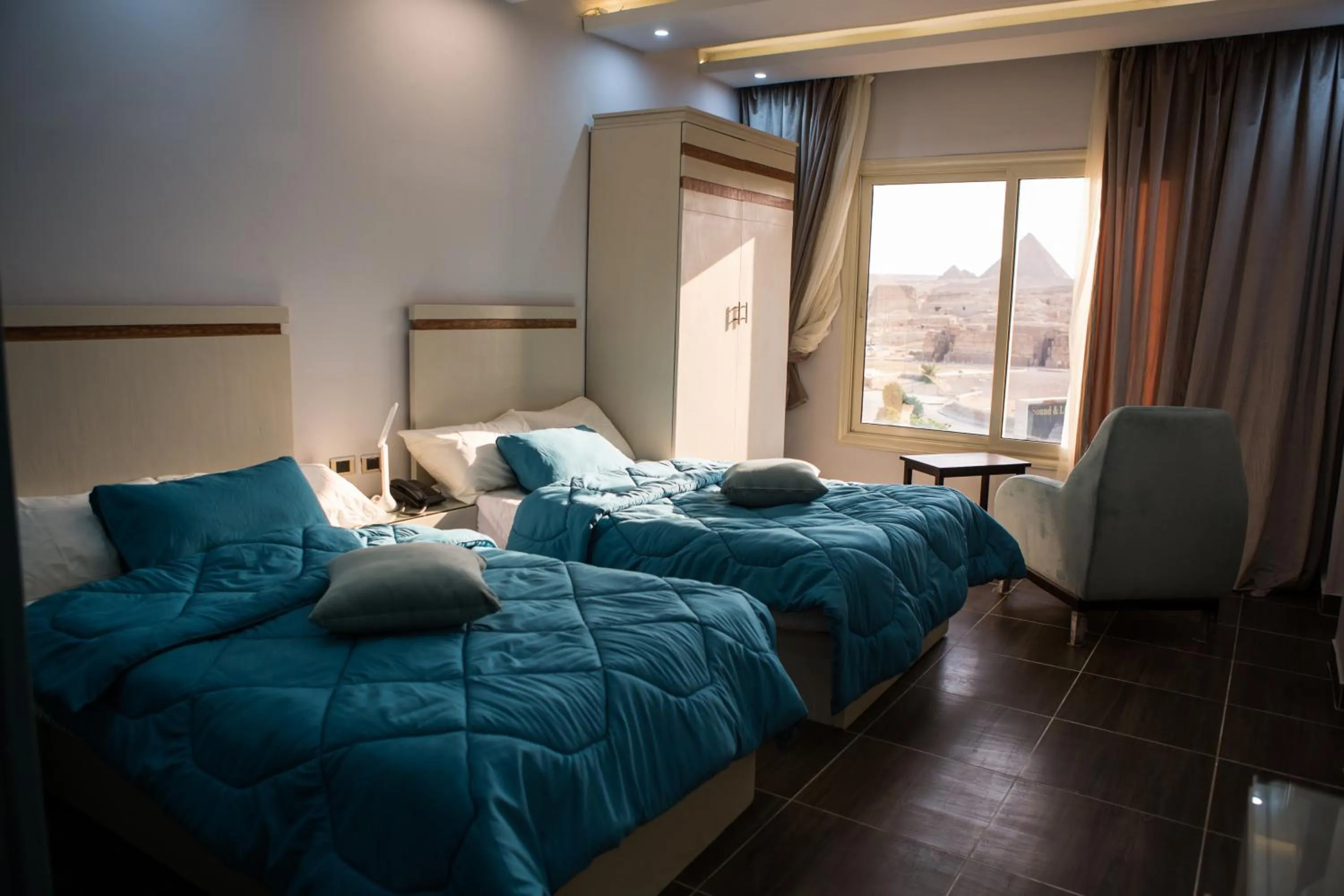 Bed in Hayat Pyramids View Hotel