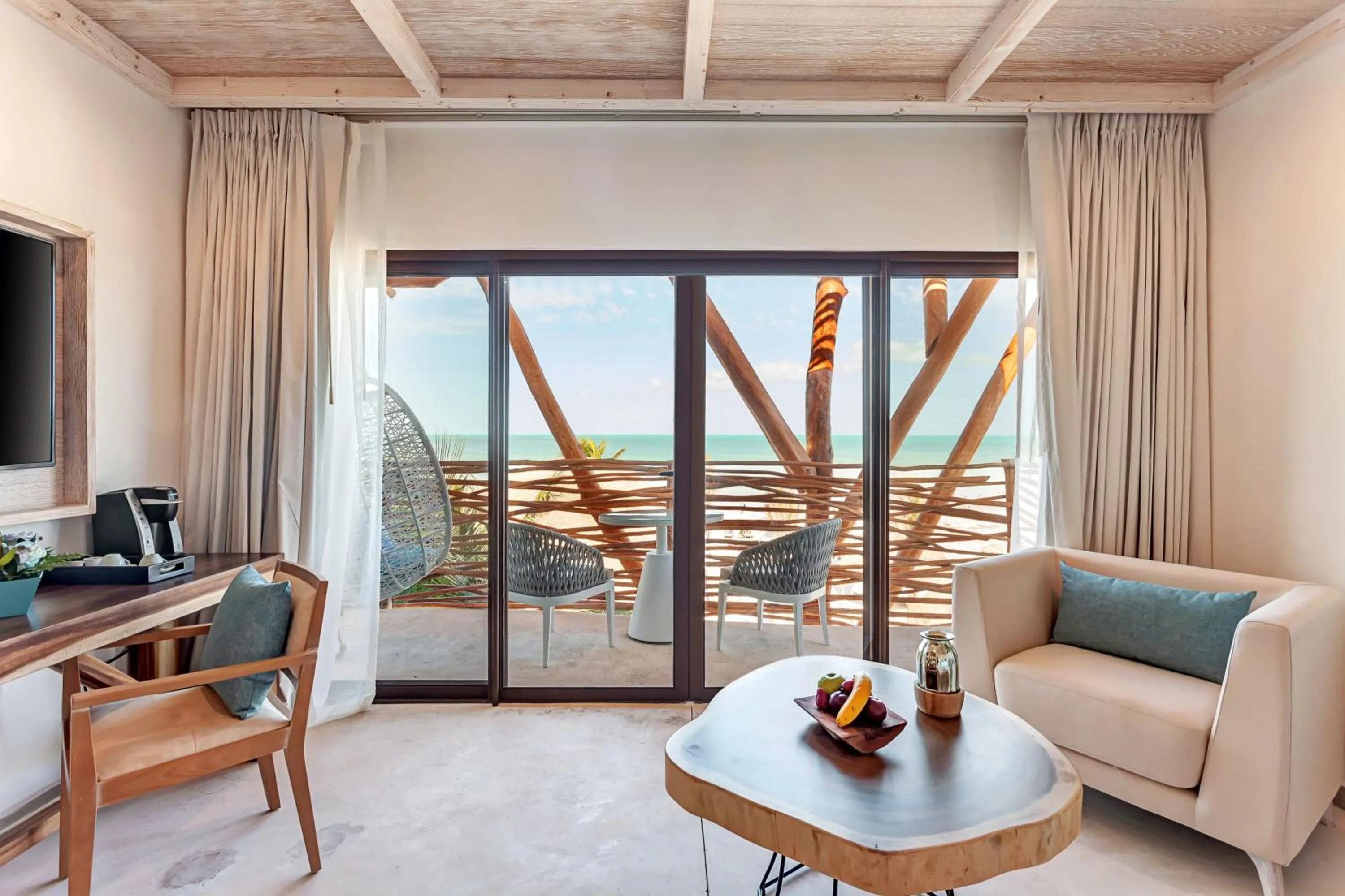 Seating area in Mystique Holbox by Royalton, A Tribute Portfolio Resort