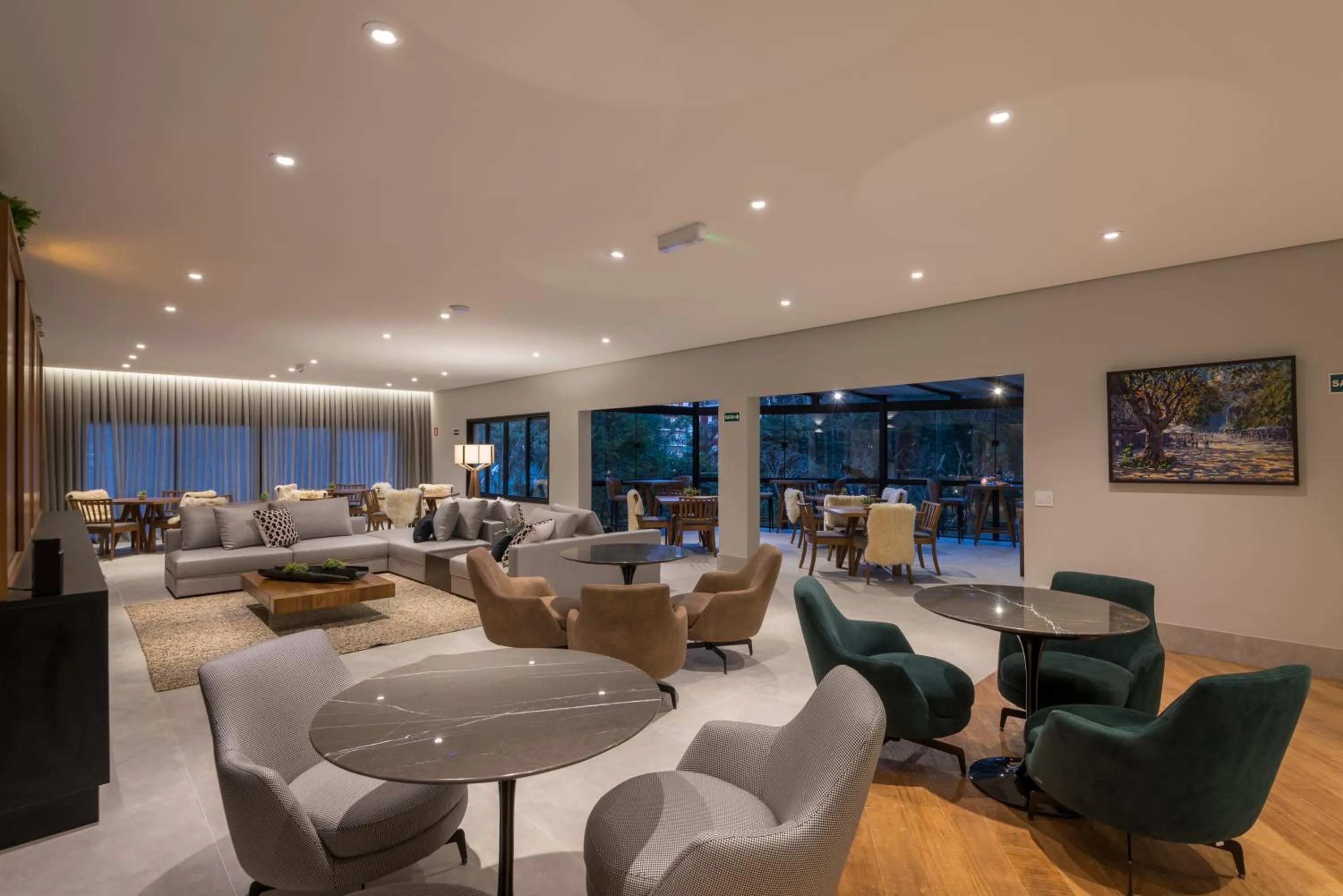 Communal lounge/ TV room in Villa Amistà Campos do Jordão