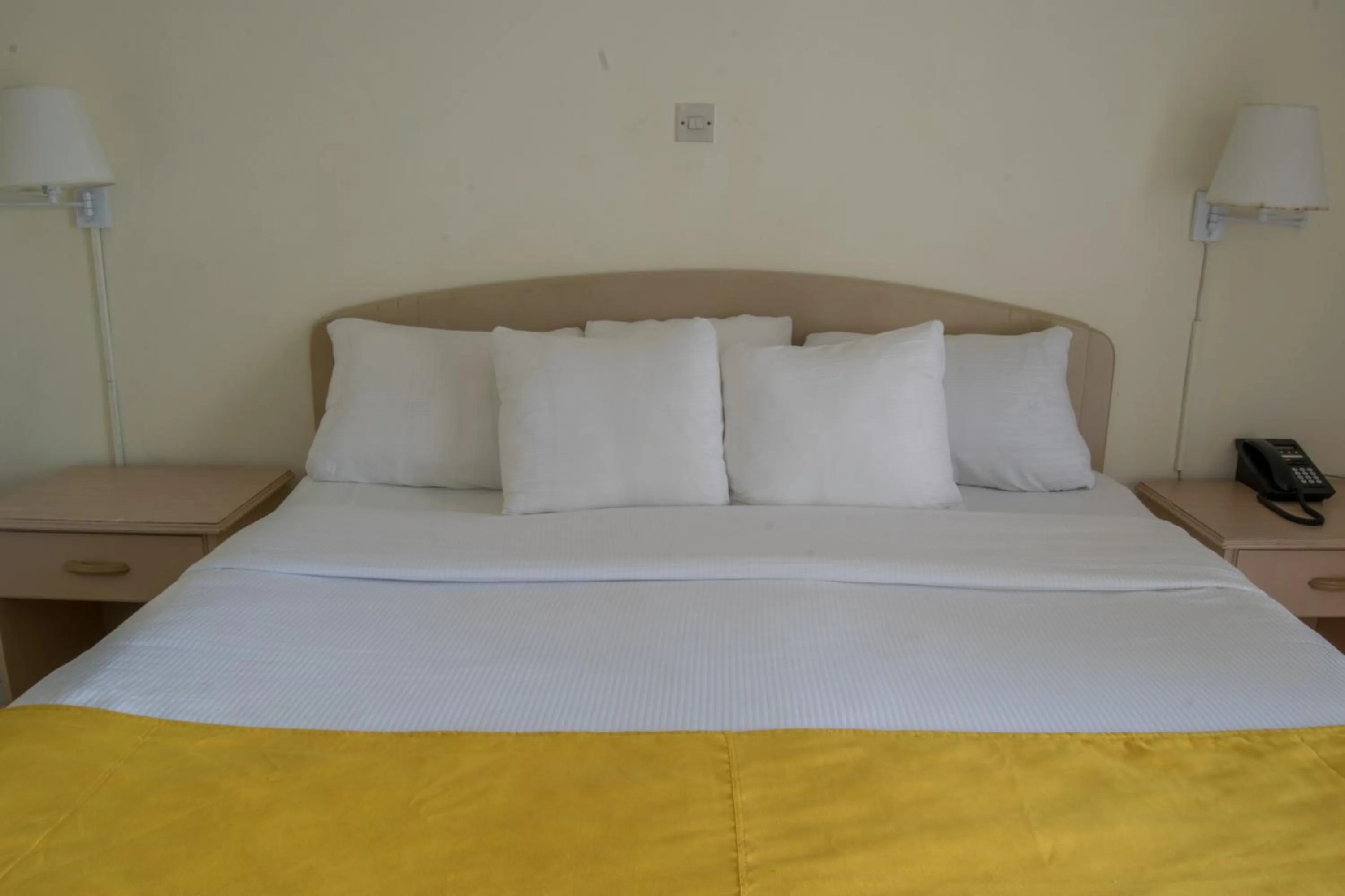 Bed in Siesta Hotel