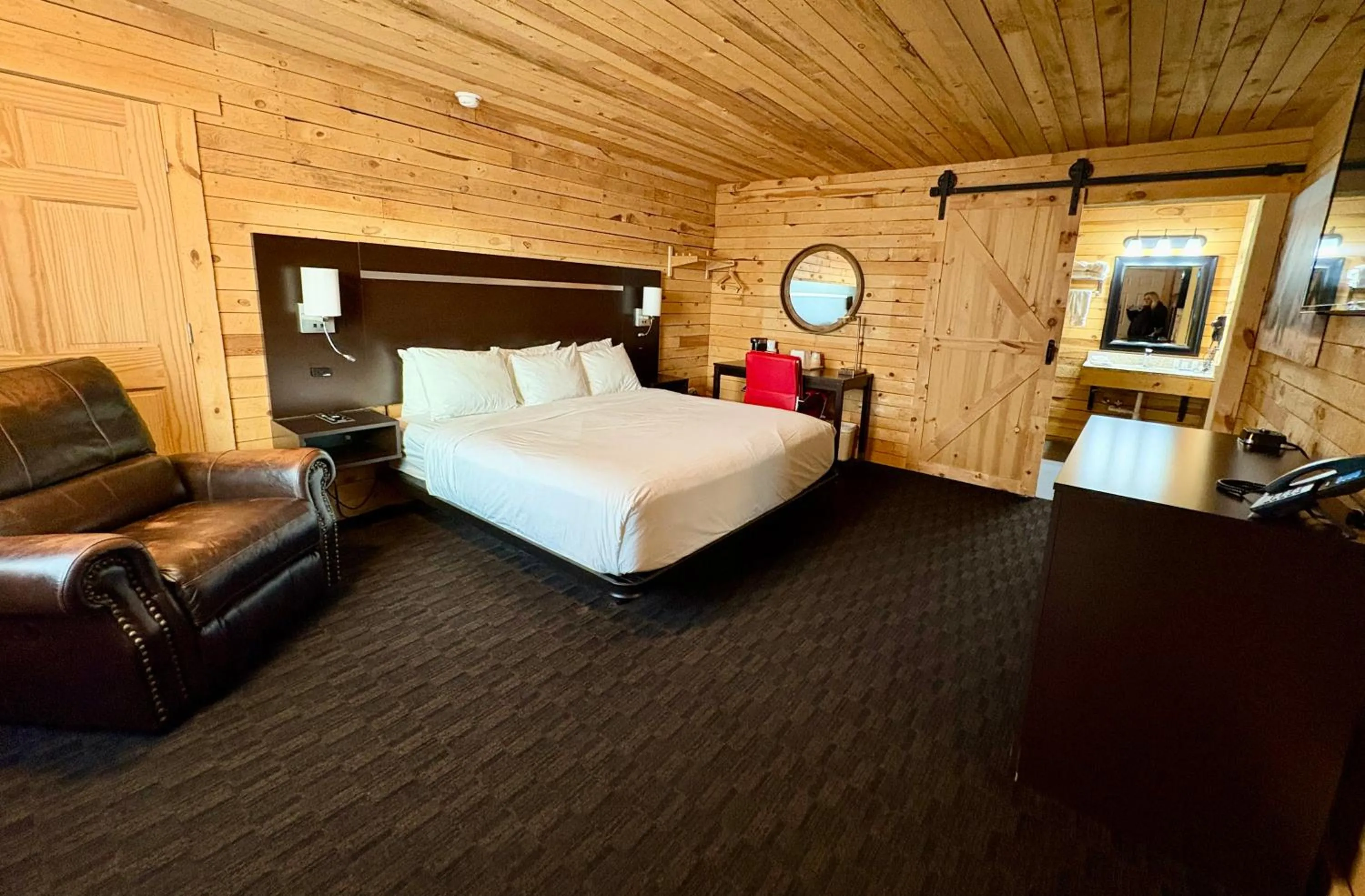 Bed in Americas Best Value Inn Wall