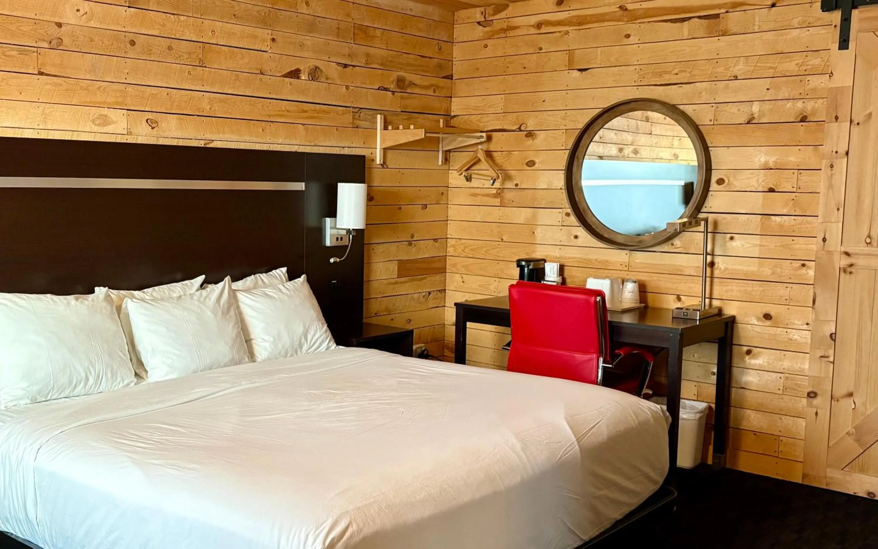 Bed in Americas Best Value Inn Wall