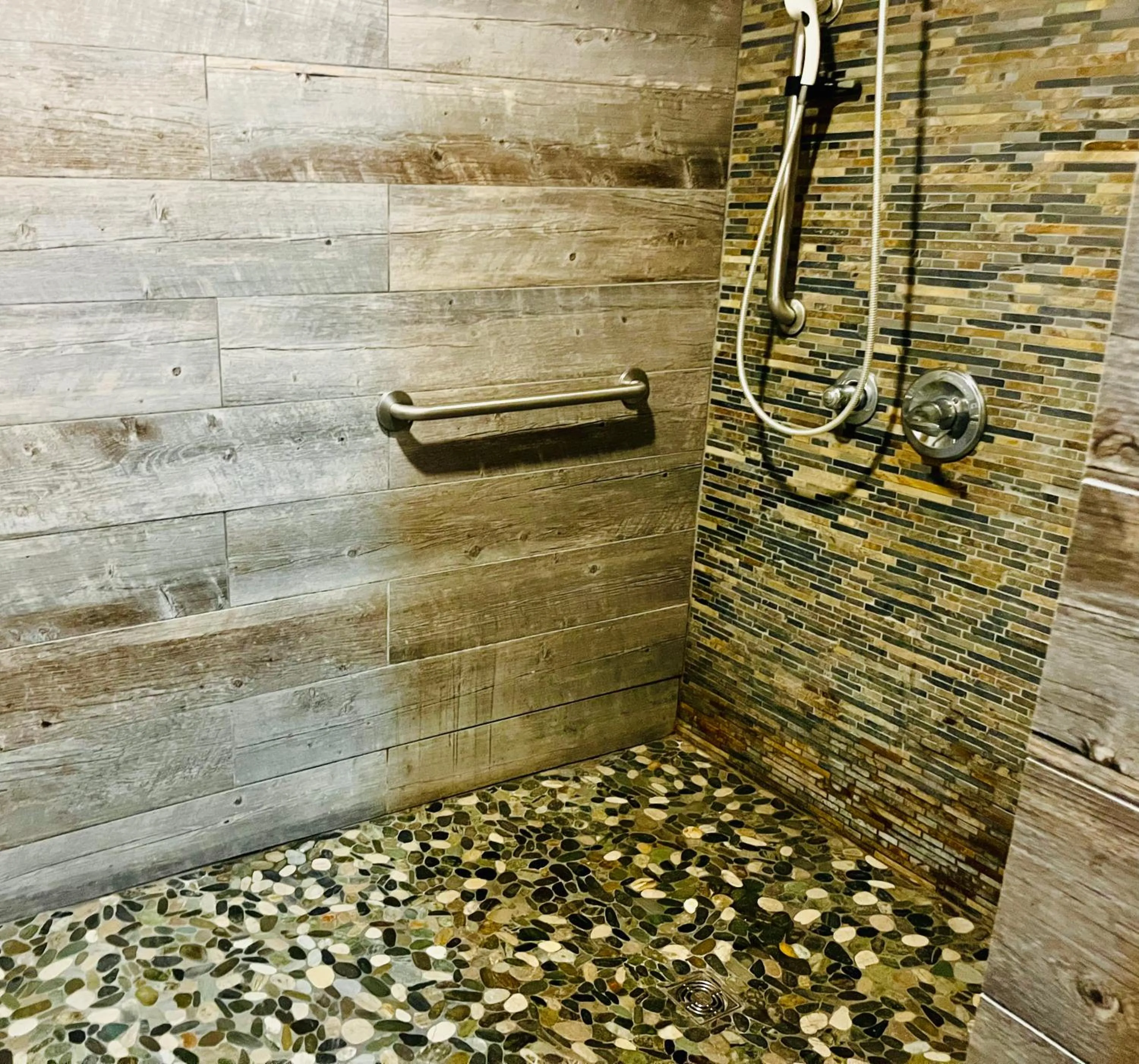 Shower in Americas Best Value Inn Wall