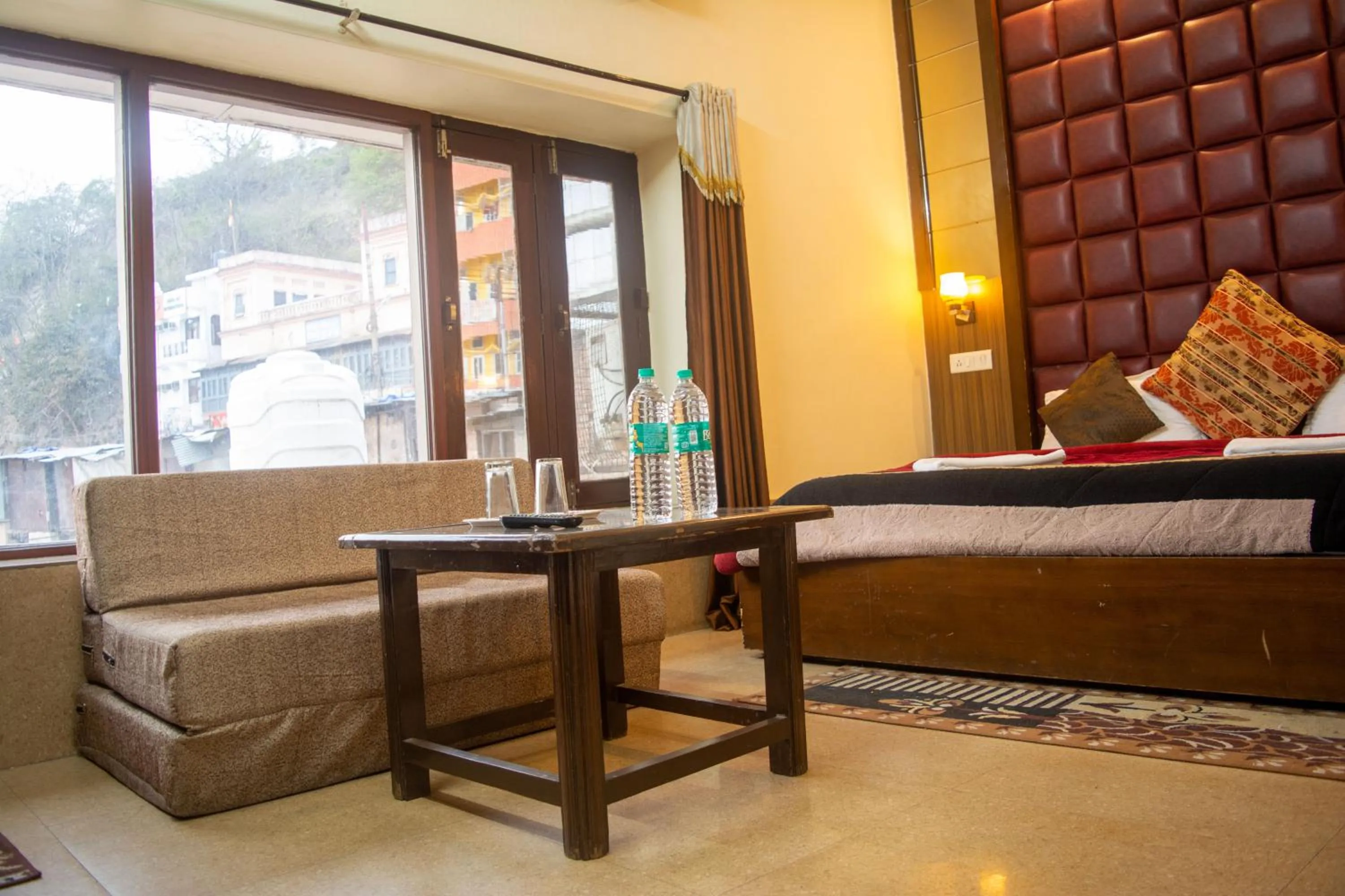 Photo of the whole room, Bed in Hotel Ganga Basin