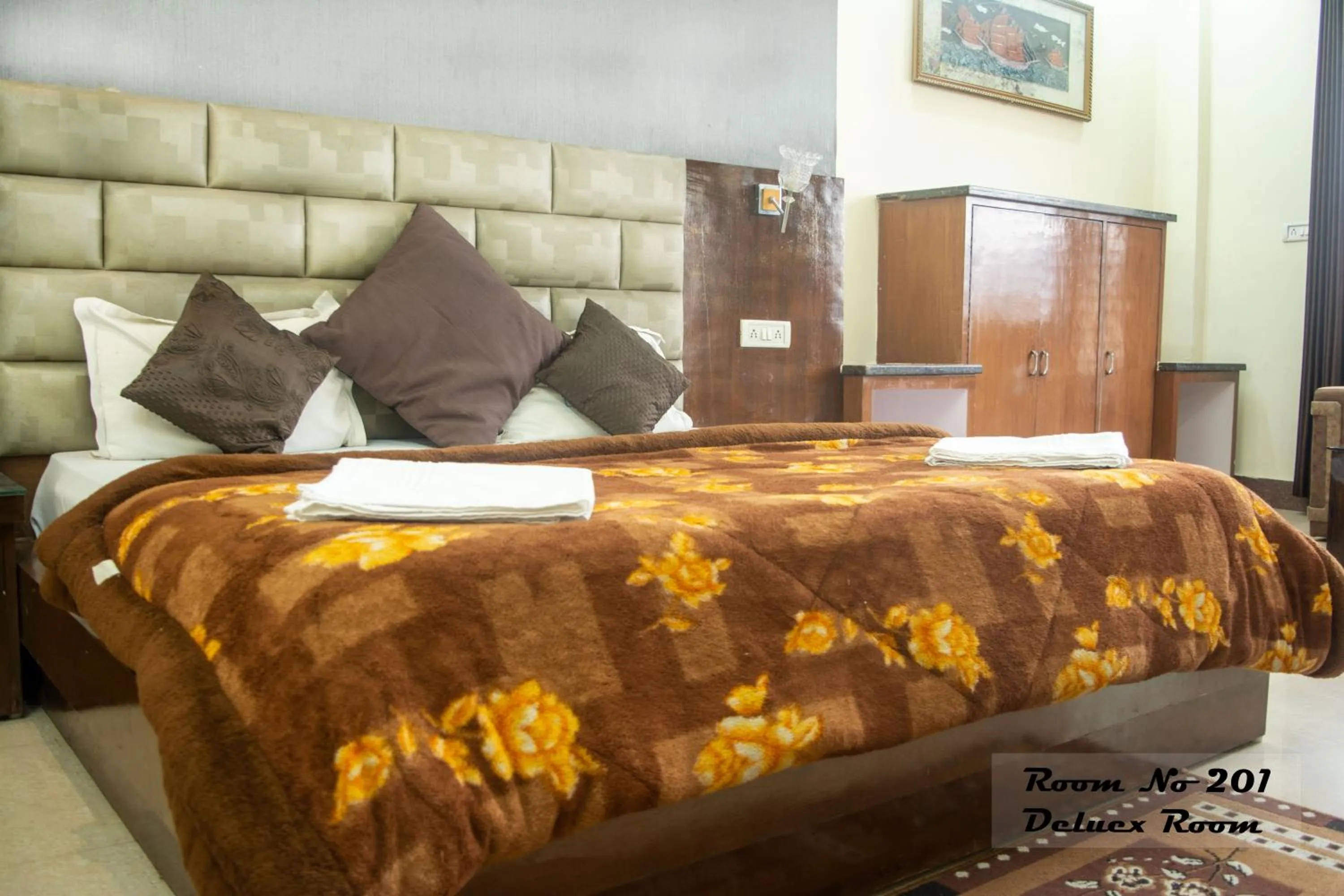 Bed in Hotel Ganga Basin
