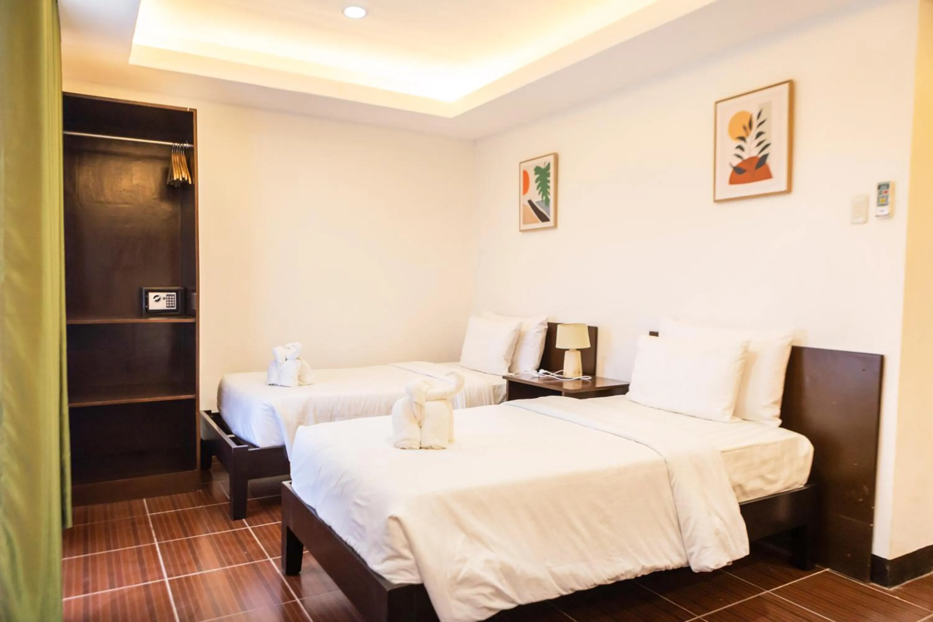 Bed in Palmbeach Resort Mactan Cebu powered by Cocotel