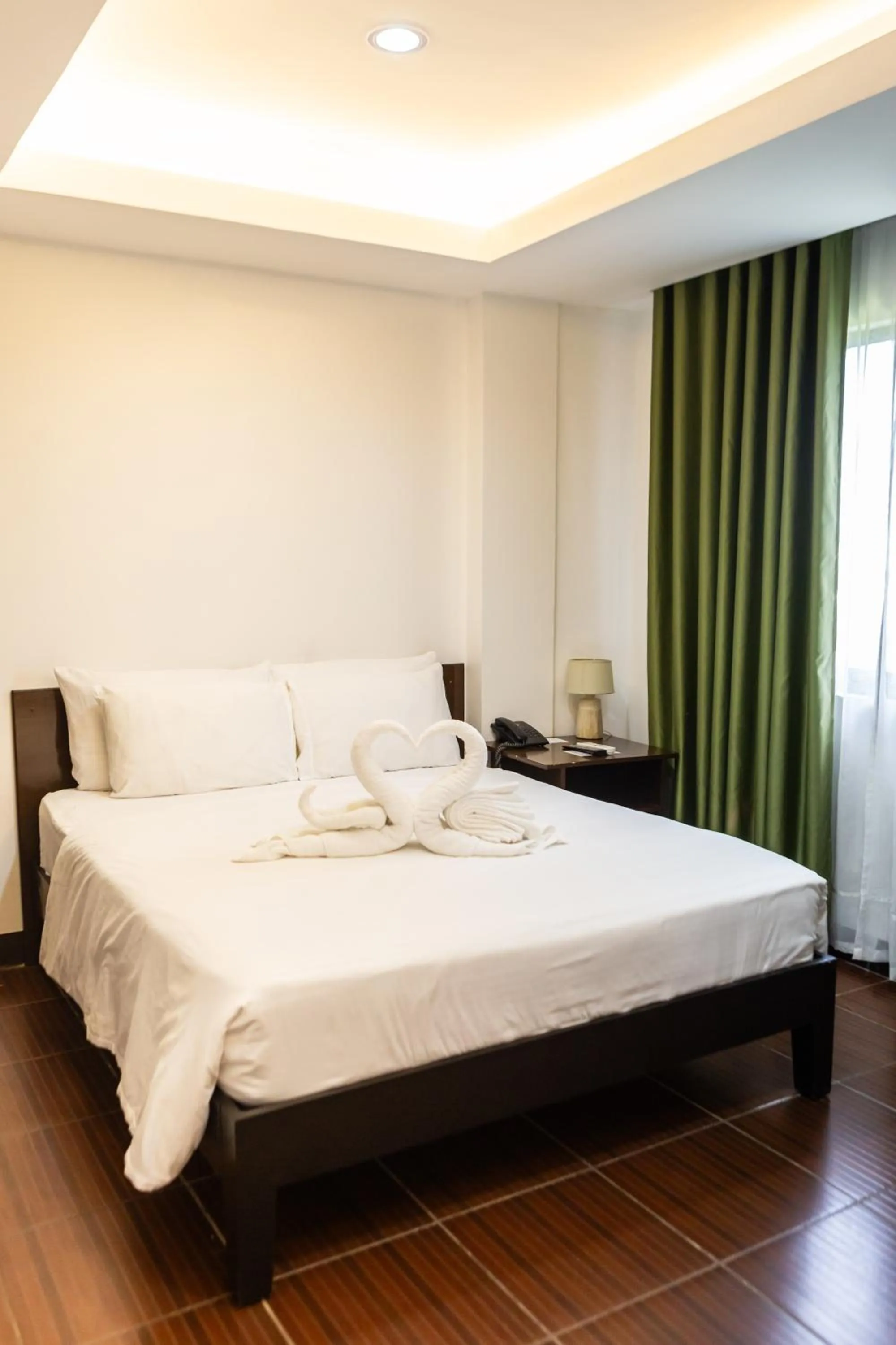 Bed in Palmbeach Resort Mactan Cebu powered by Cocotel