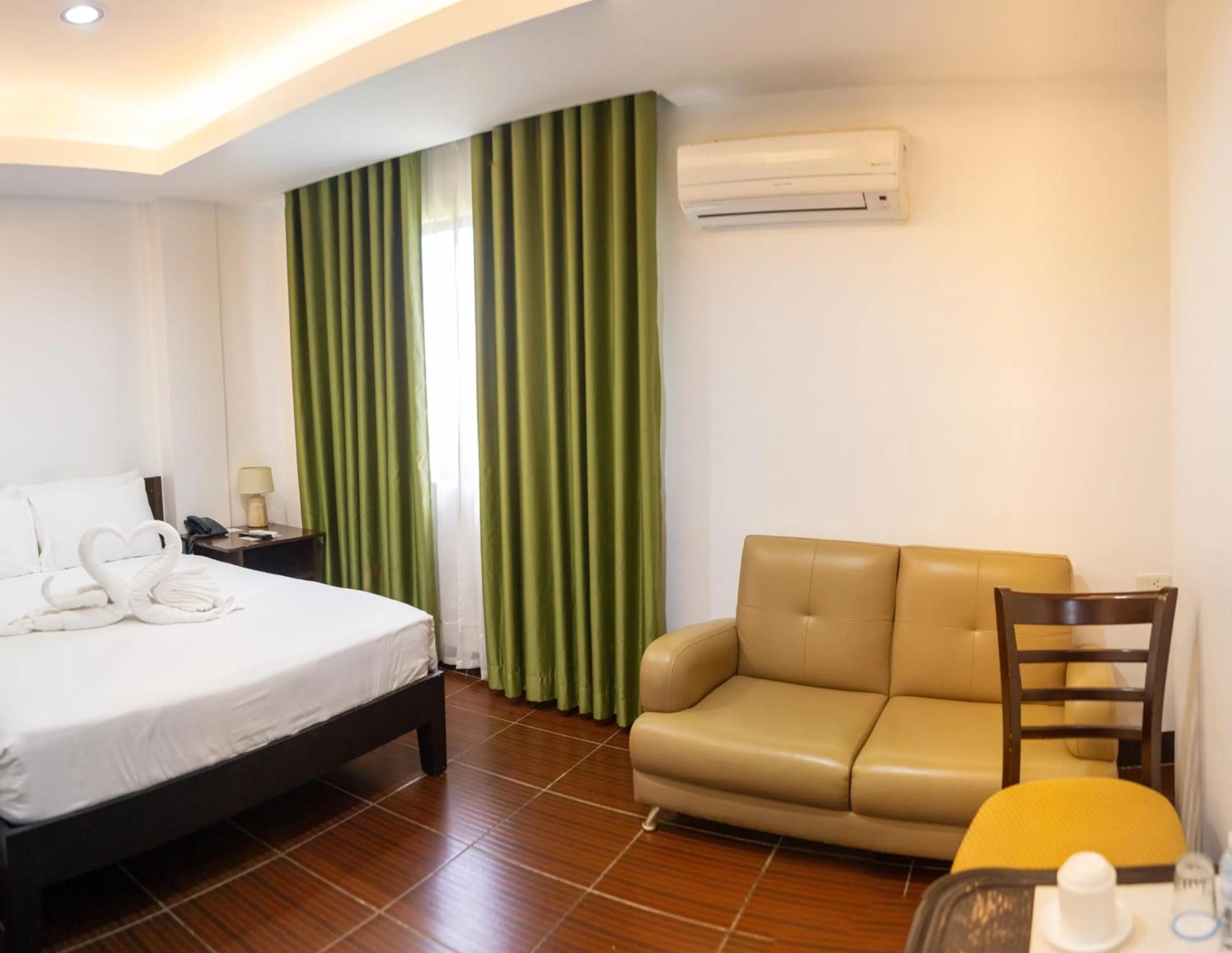 Photo of the whole room, Bed in Palmbeach Resort Mactan Cebu powered by Cocotel